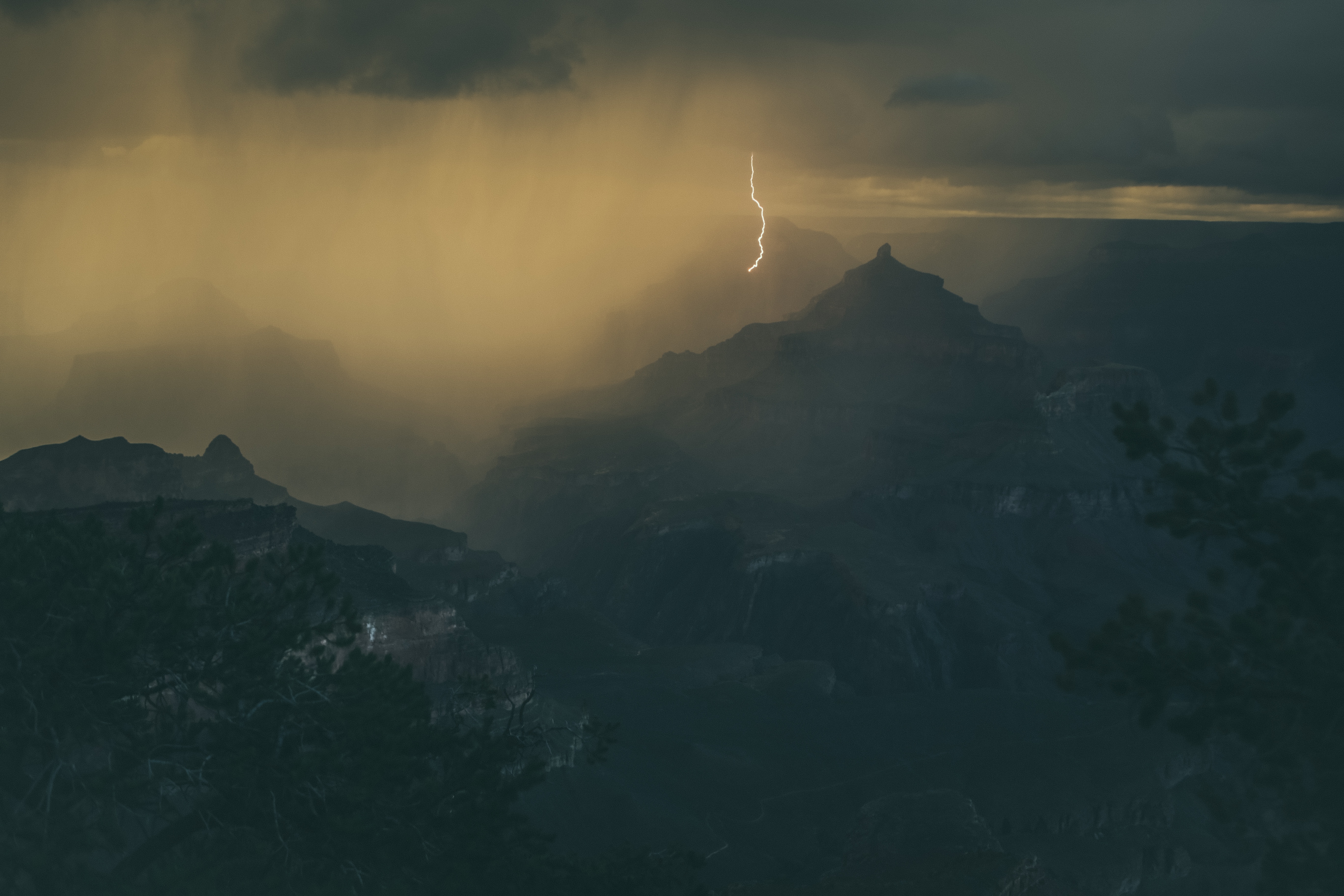 Lightning strikes over the Grand Canyon during a storm HD Wallpaper