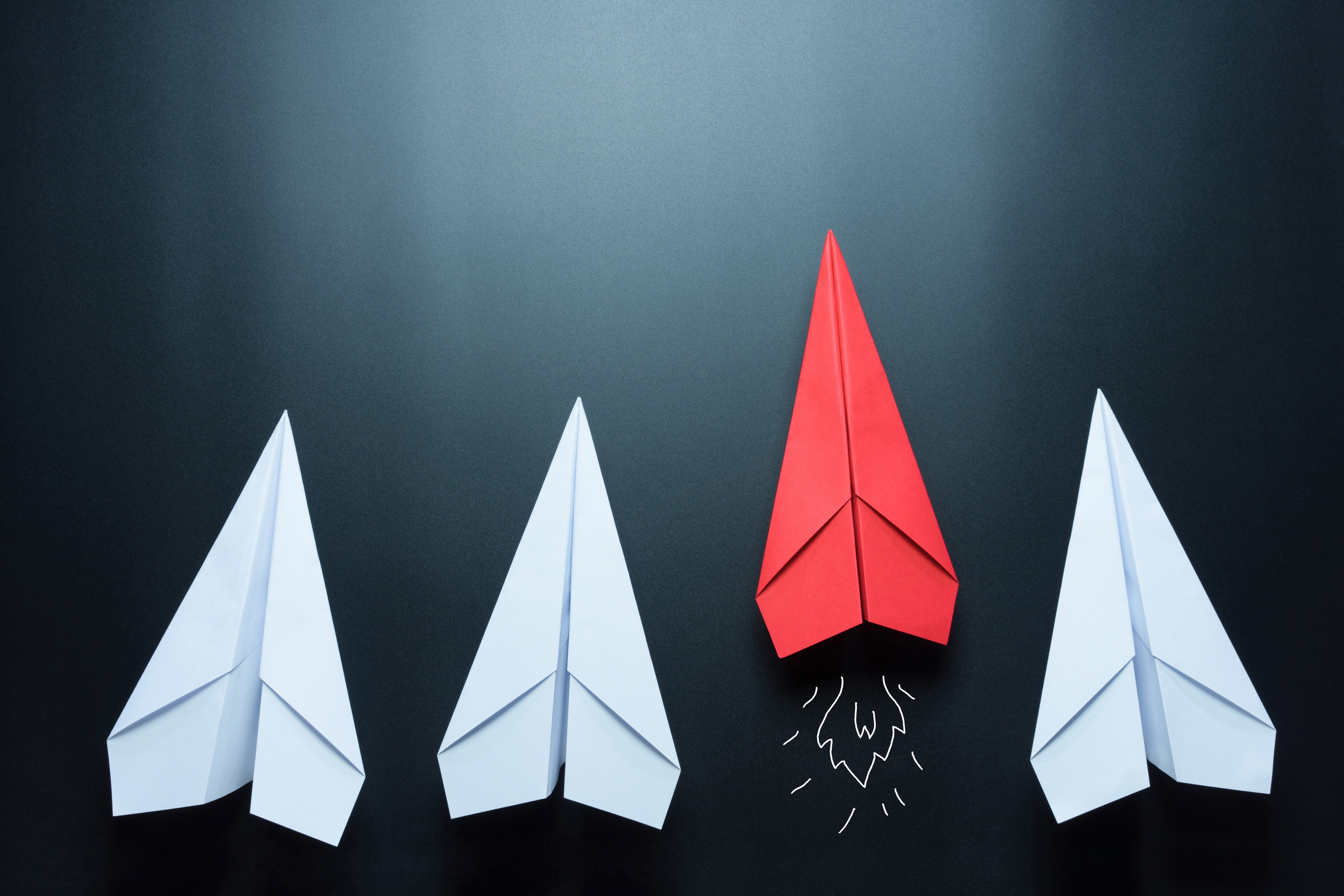 Red paper plane leading white paper planes HD Wallpaper