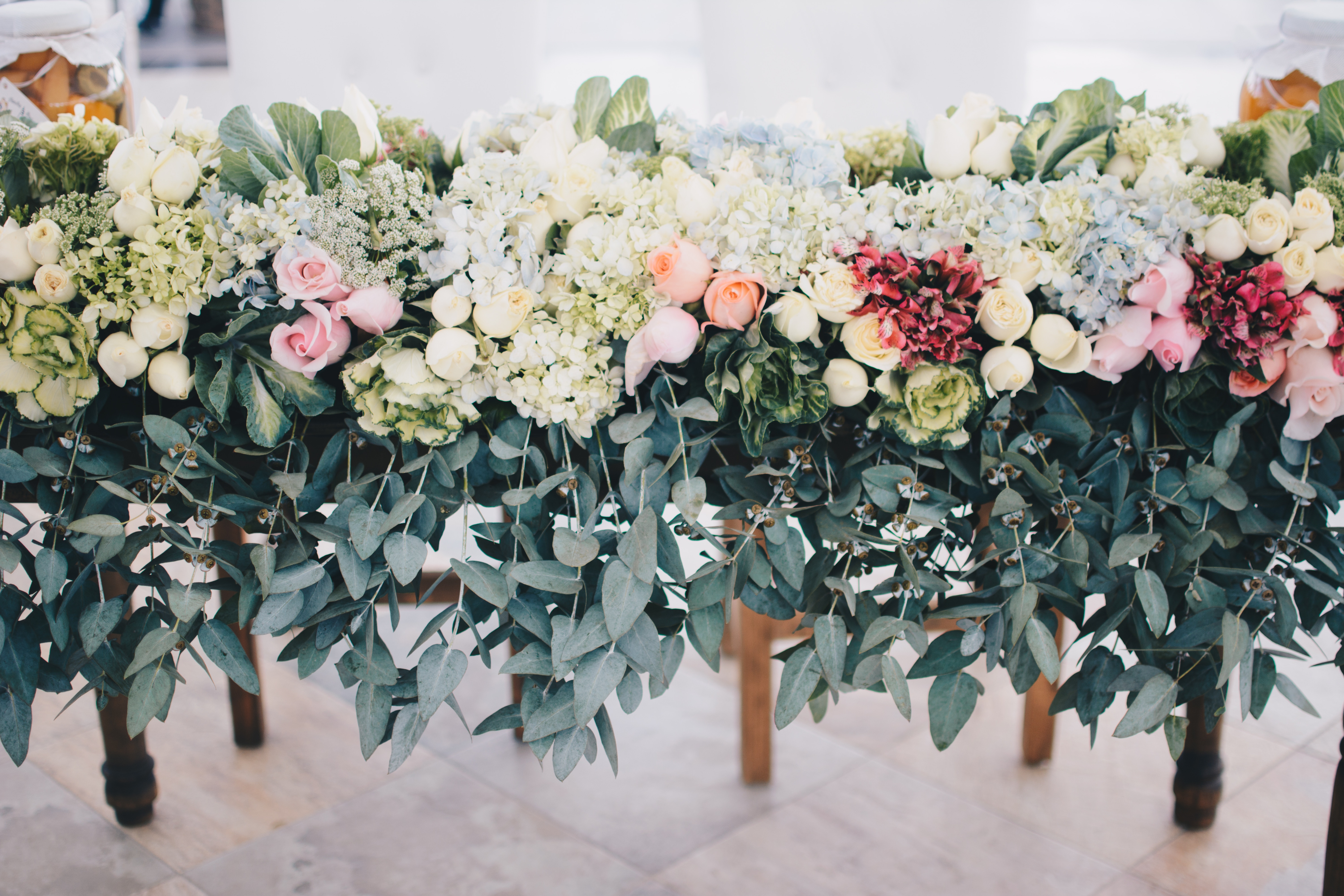 Wedding floral arrangement with roses and eucalyptus HD Wallpaper