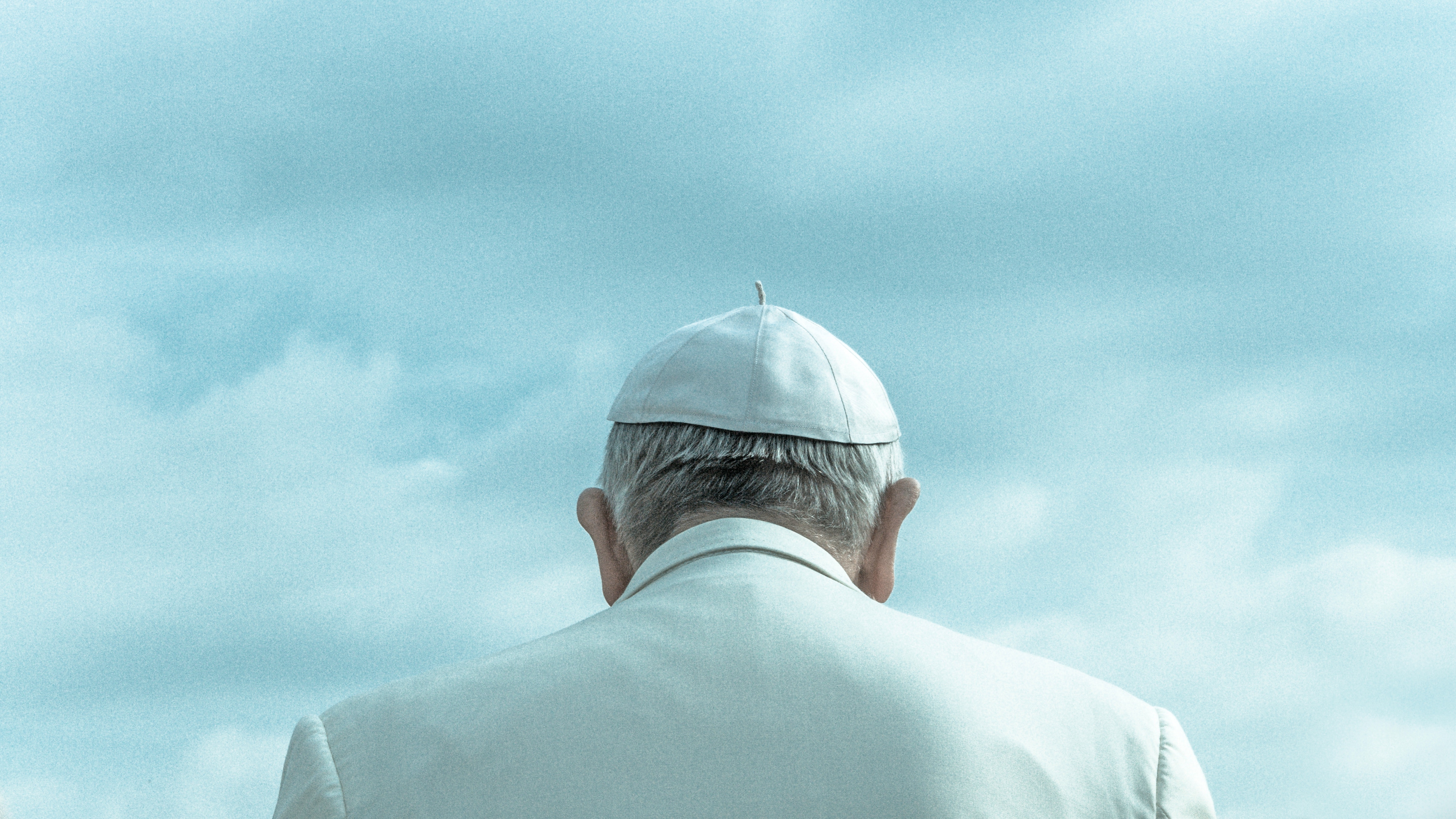 Pope Francis wearing a zucchetto against a cloudy sky HD Wallpaper
