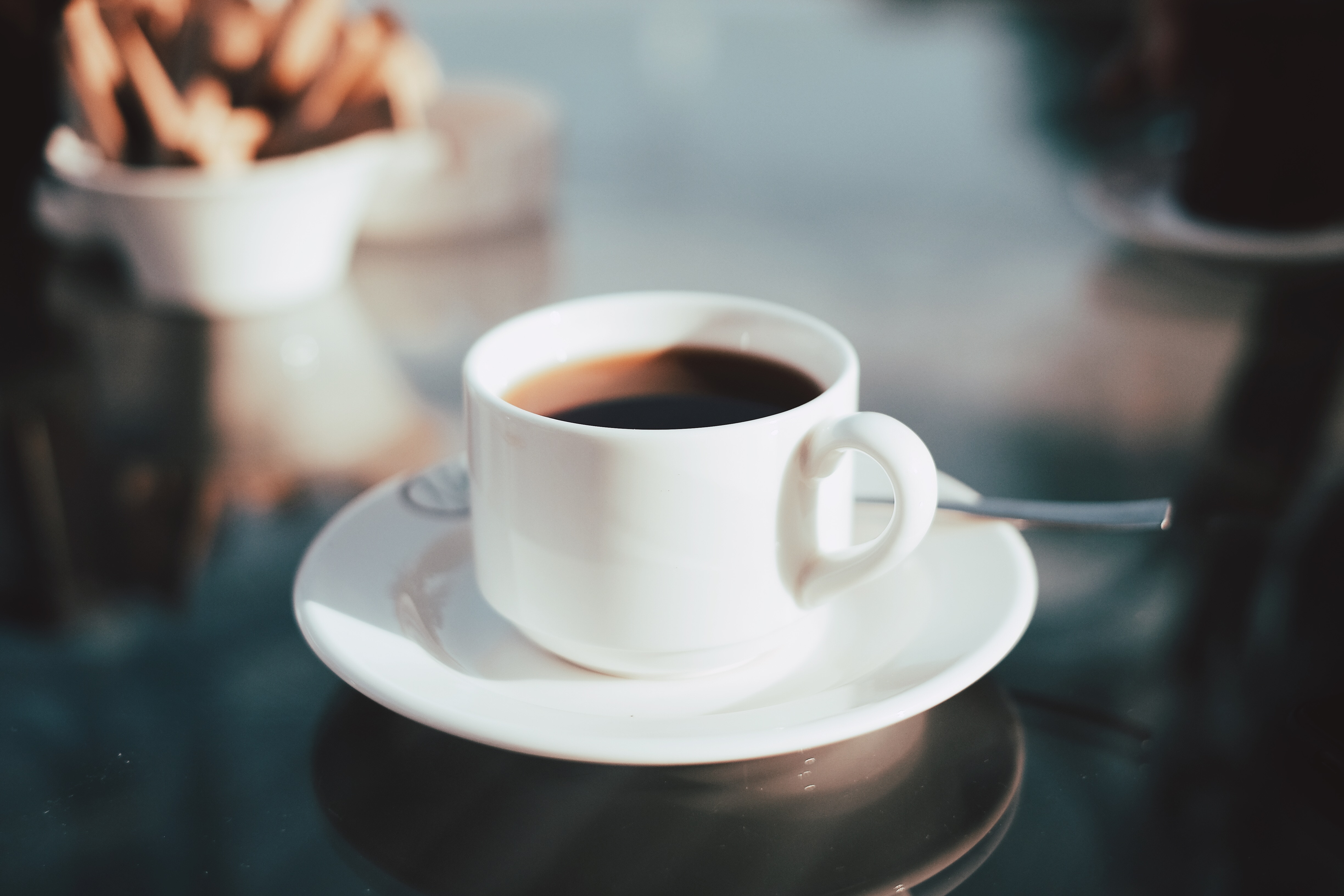 White cup of coffee on a saucer HD Wallpaper