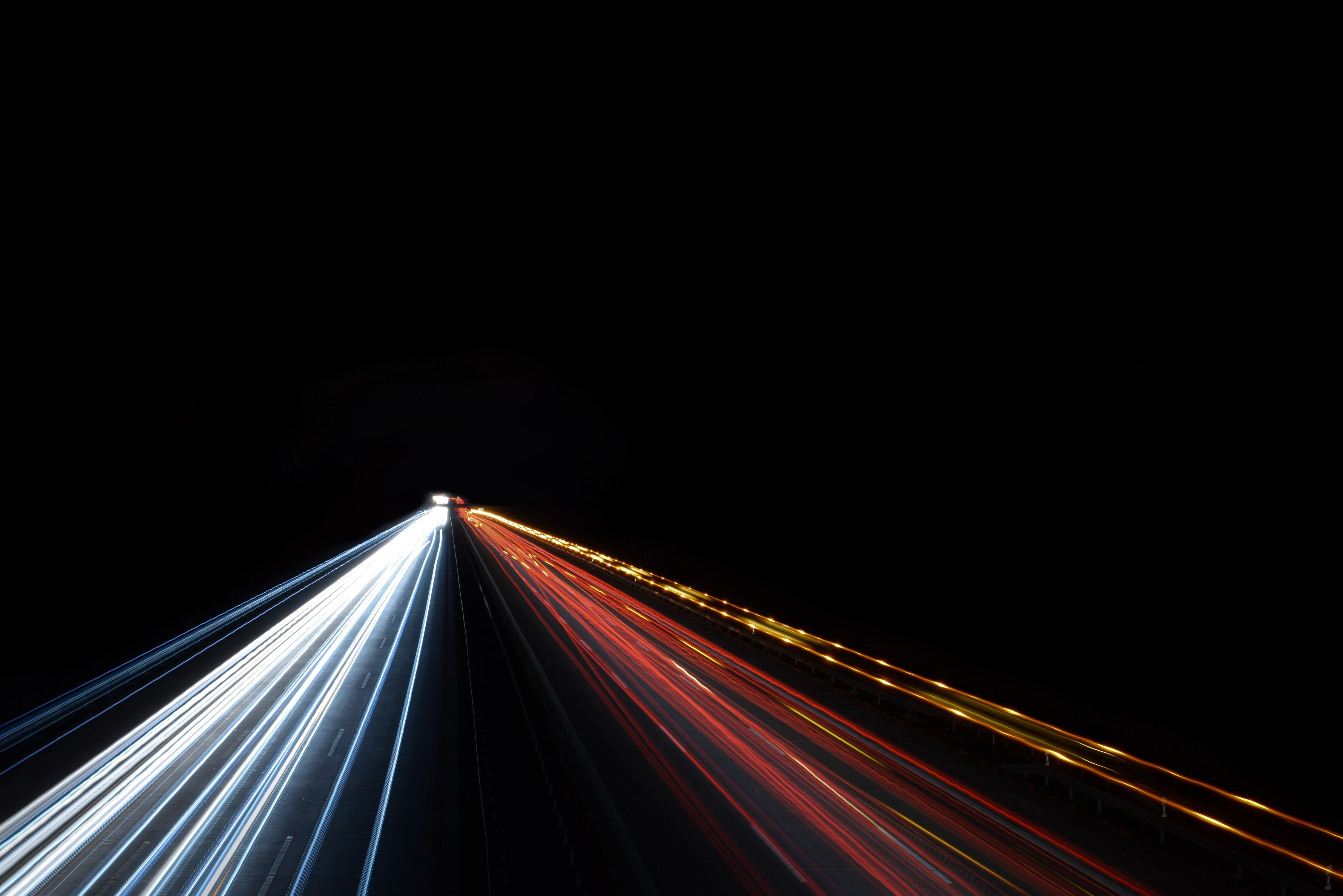 Long exposure of highway traffic at night HD Wallpaper