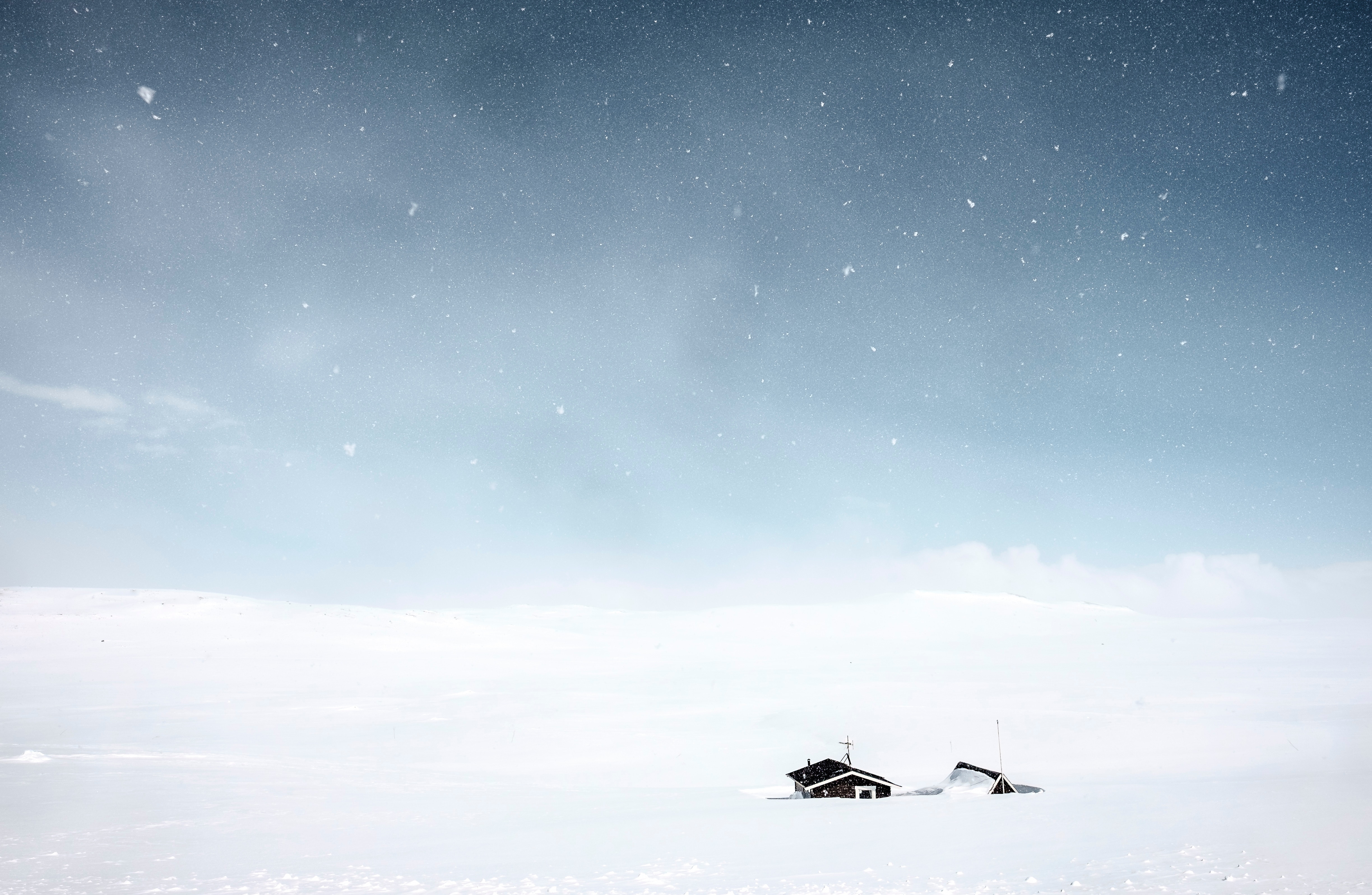Two cabins in a snowstorm in Norway HD Wallpaper