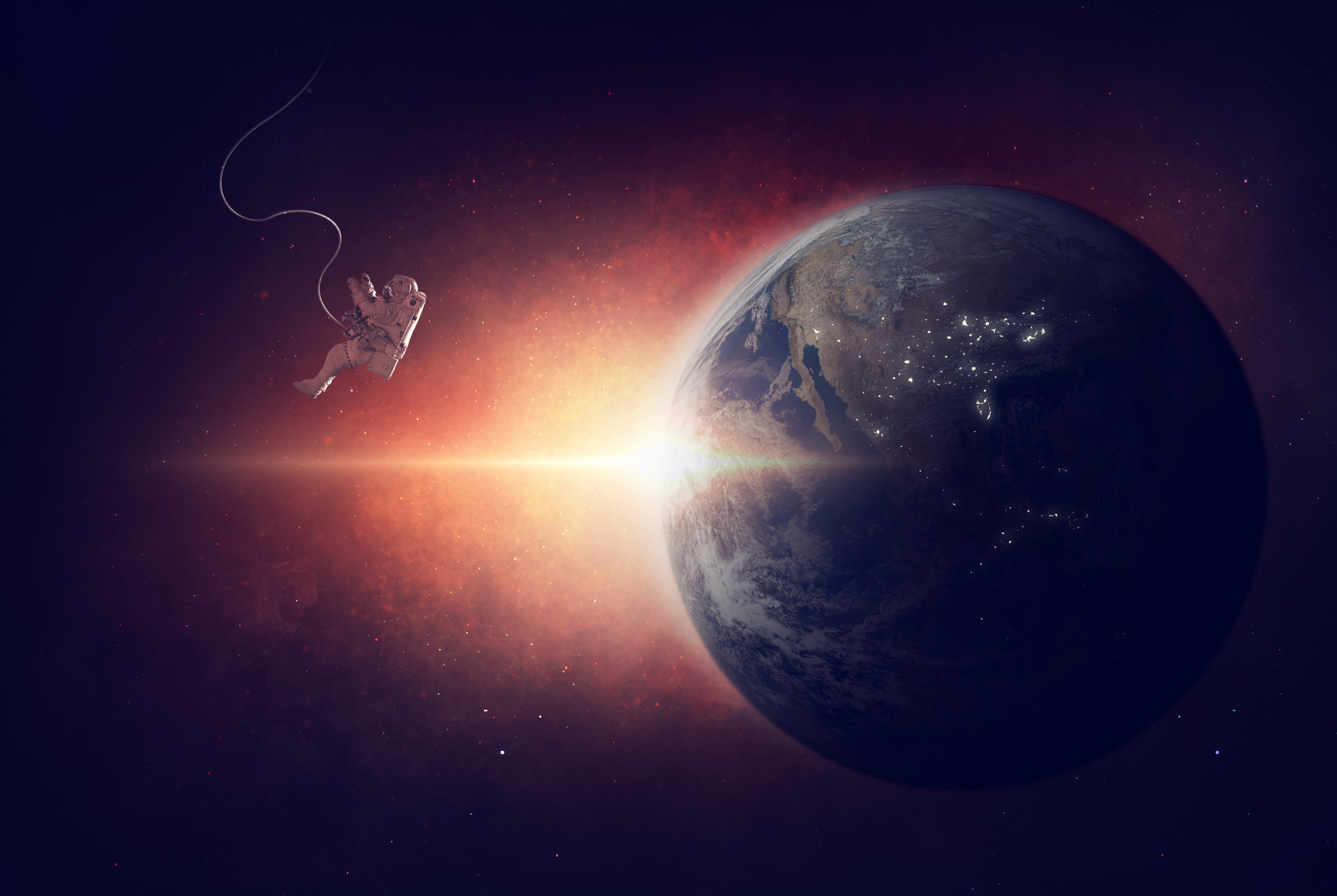 Astronaut floating in space near Earth during sunrise HD Wallpaper