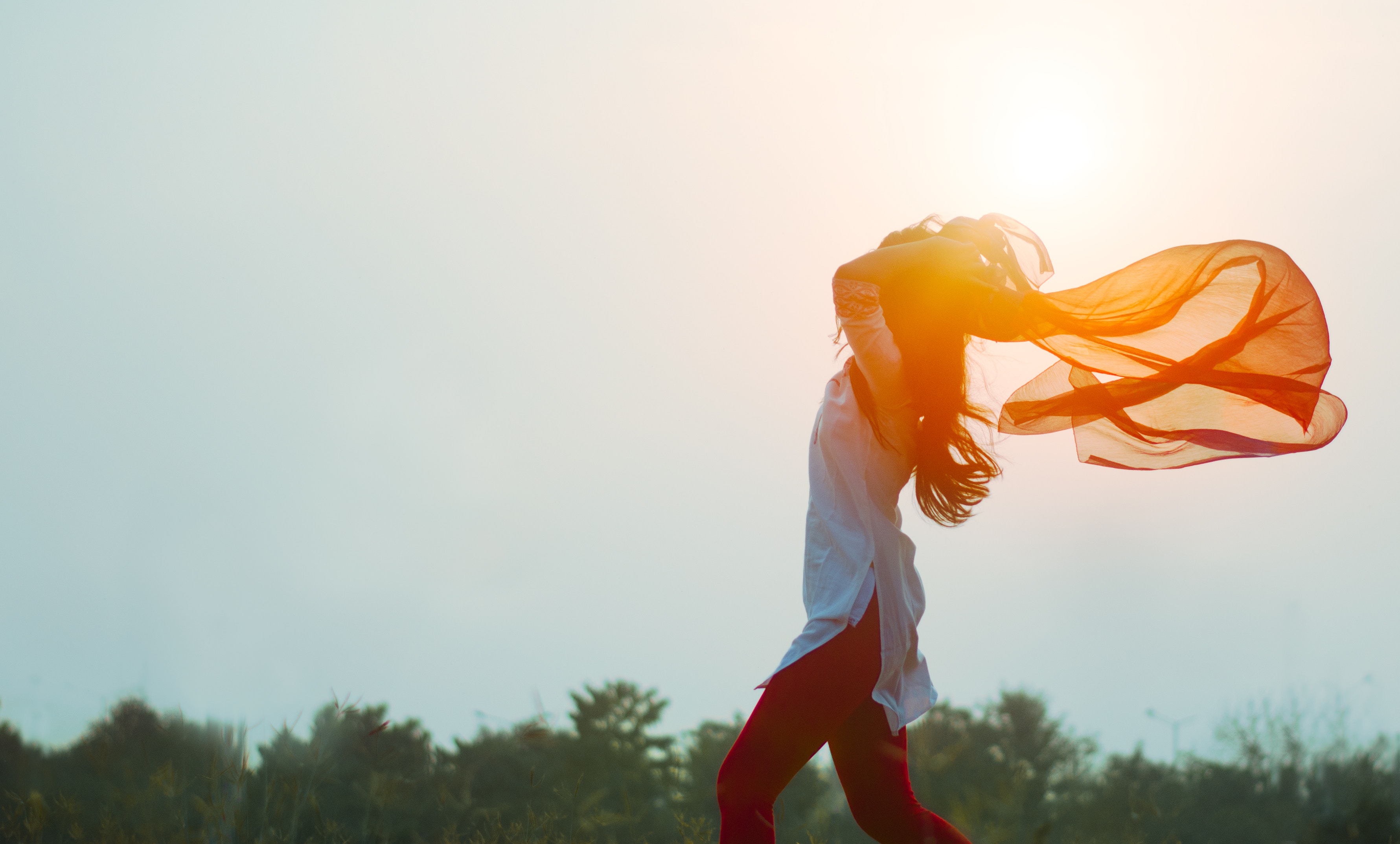 Woman with scarf in sunset light HD Wallpaper