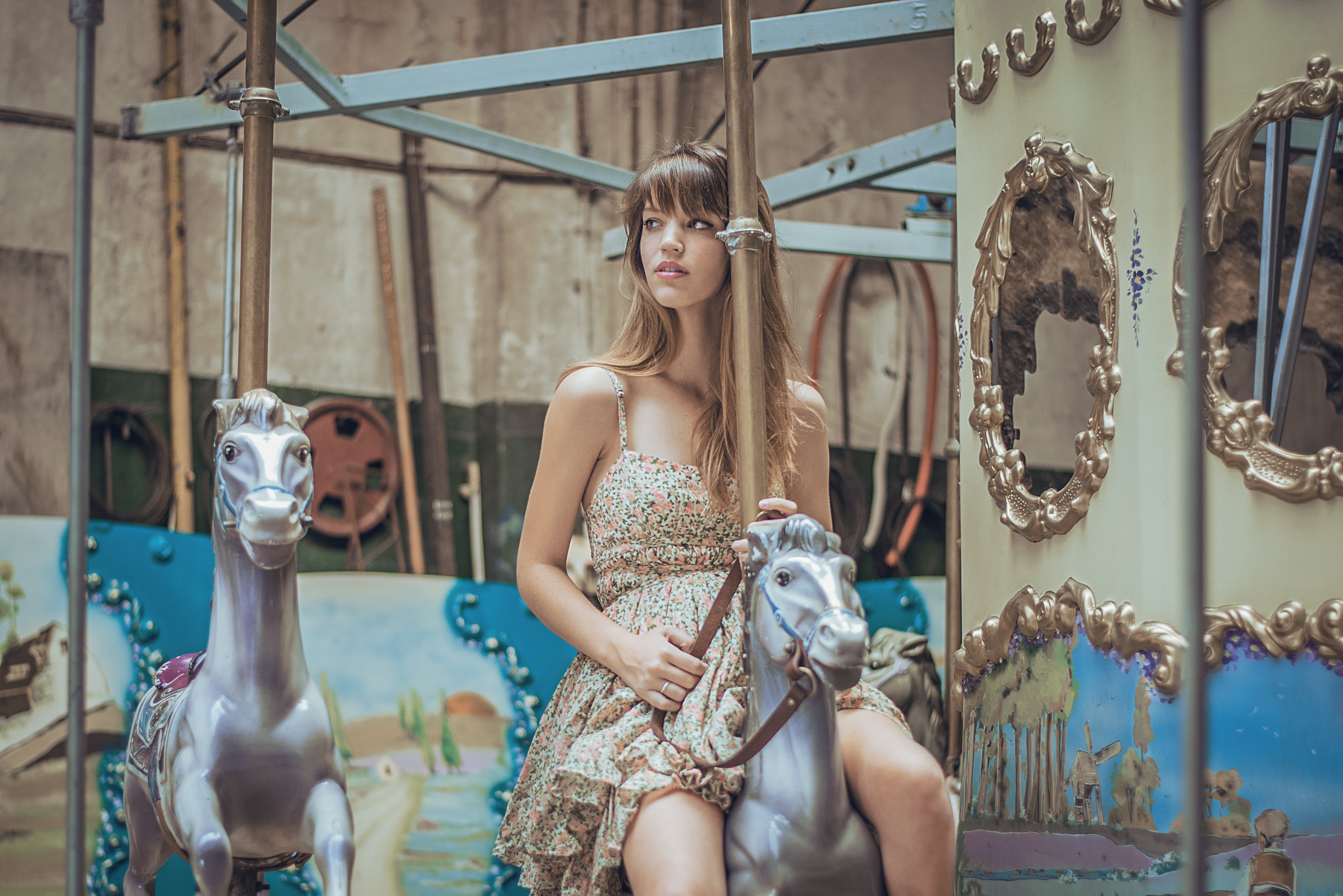 Woman on a carousel horse HD Wallpaper