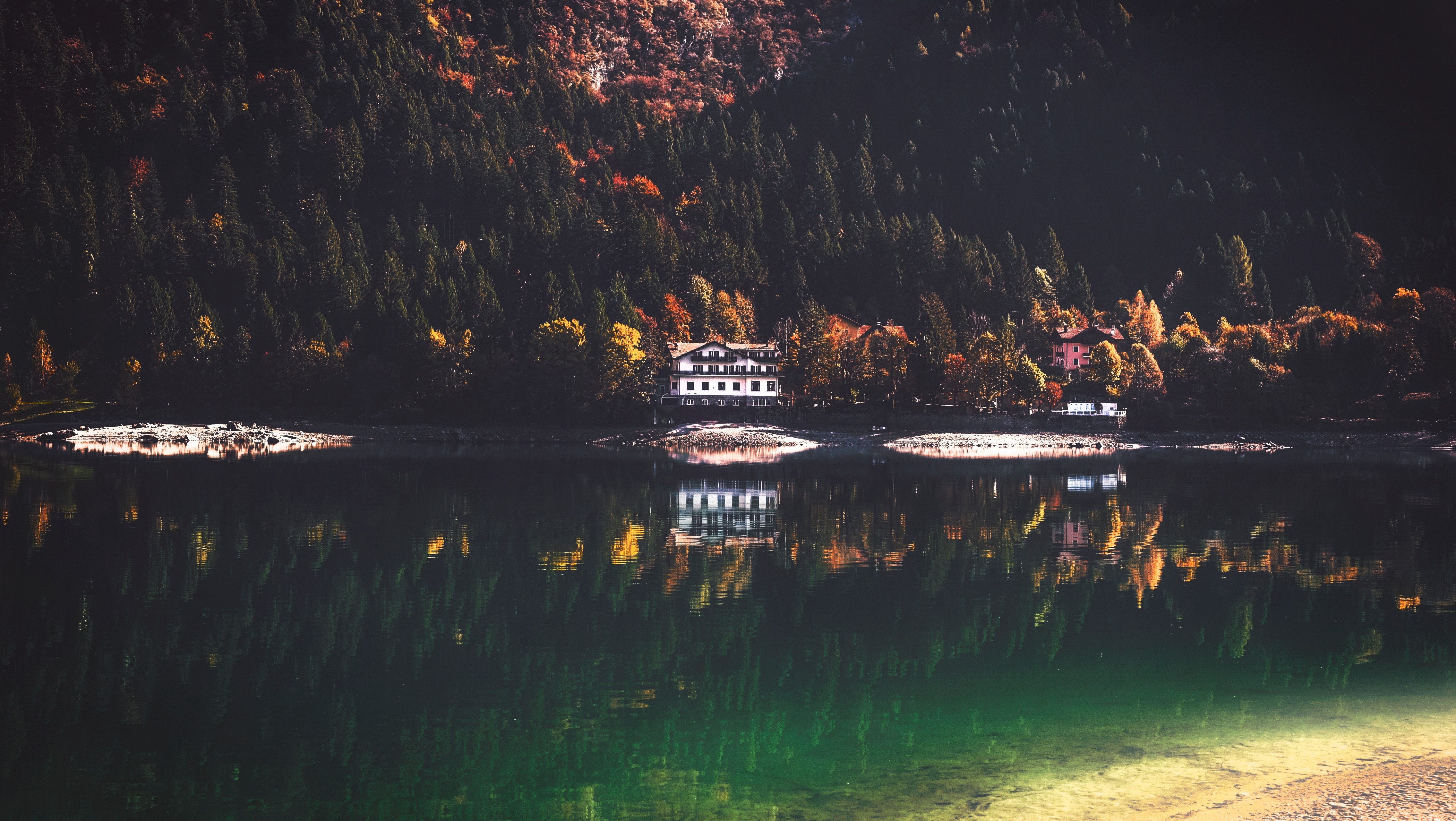 Autumn lake reflection with buildings and forest HD Wallpaper