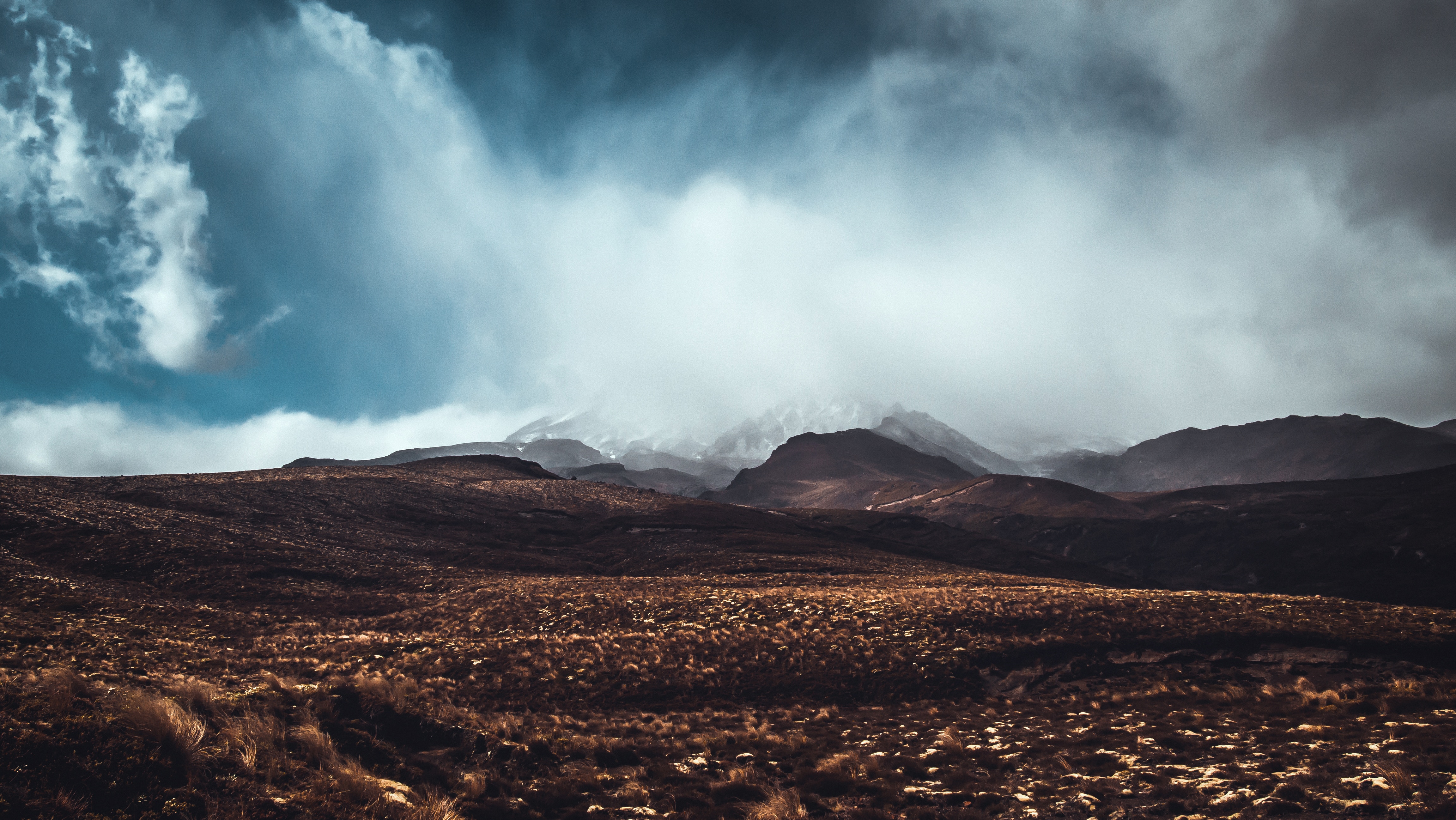 Mountain landscape with clouds and dry grass HD Wallpaper