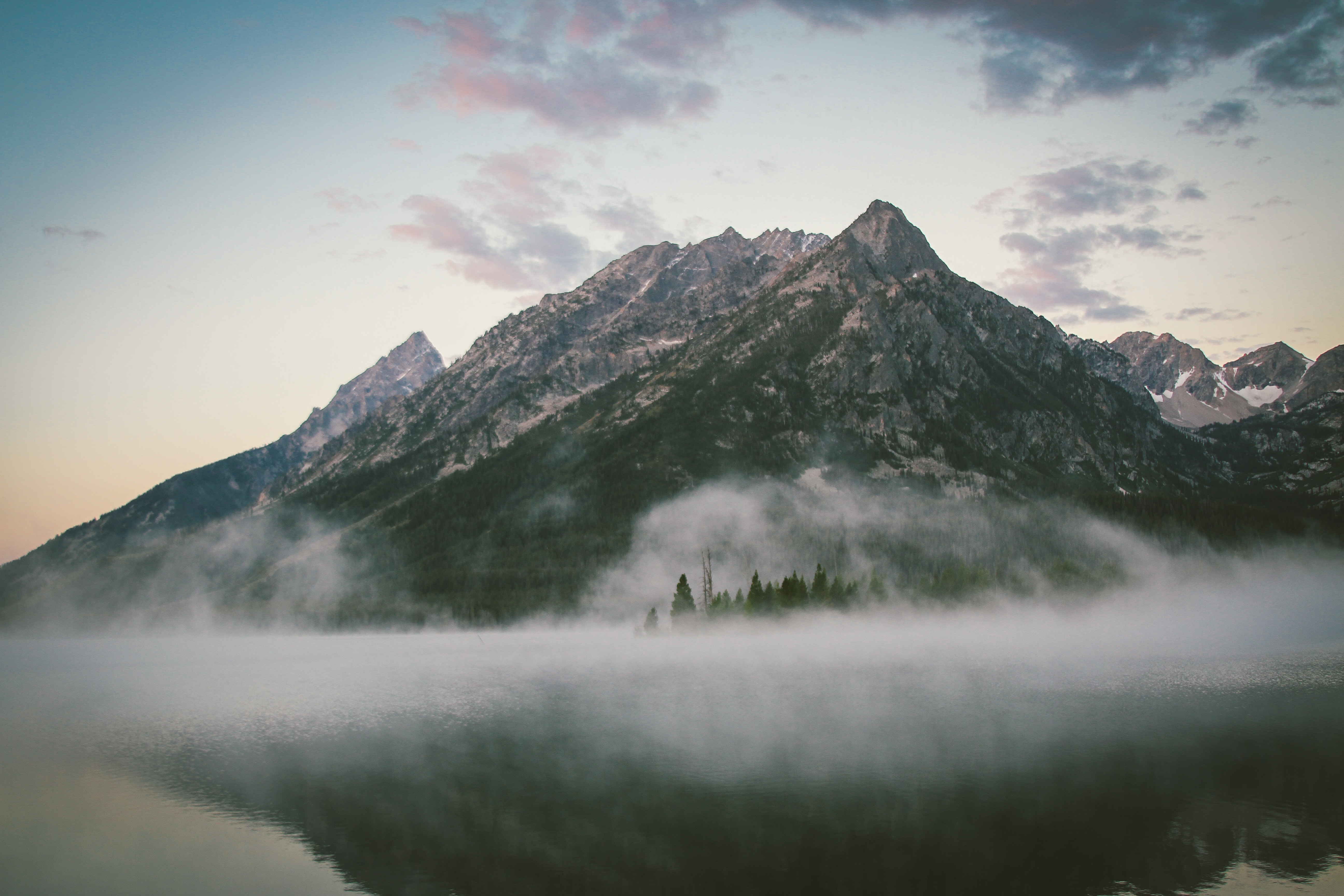 Misty mountain lake at sunrise with reflection HD Wallpaper