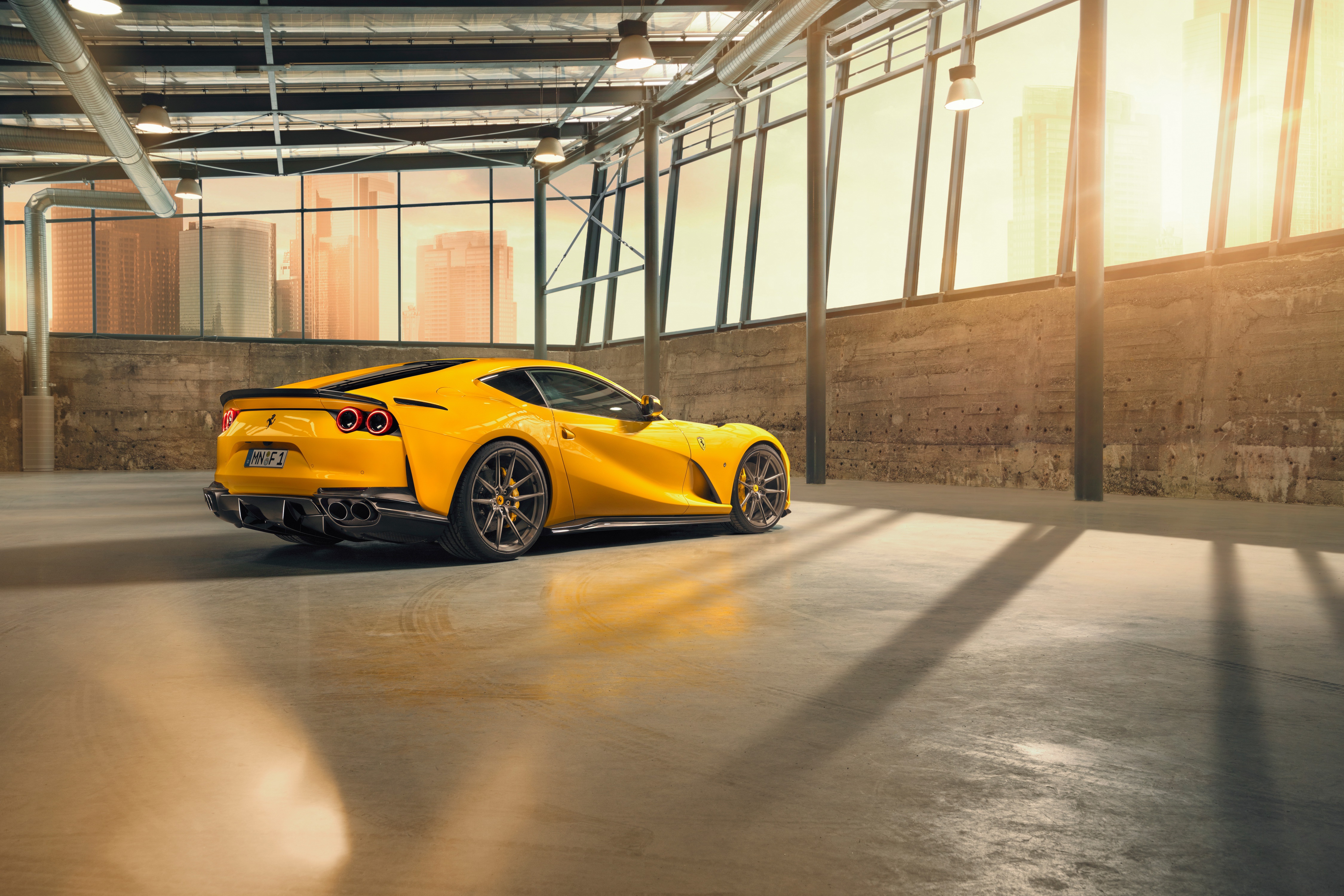Yellow Ferrari 812 Superfast parked in a warehouse HD Wallpaper