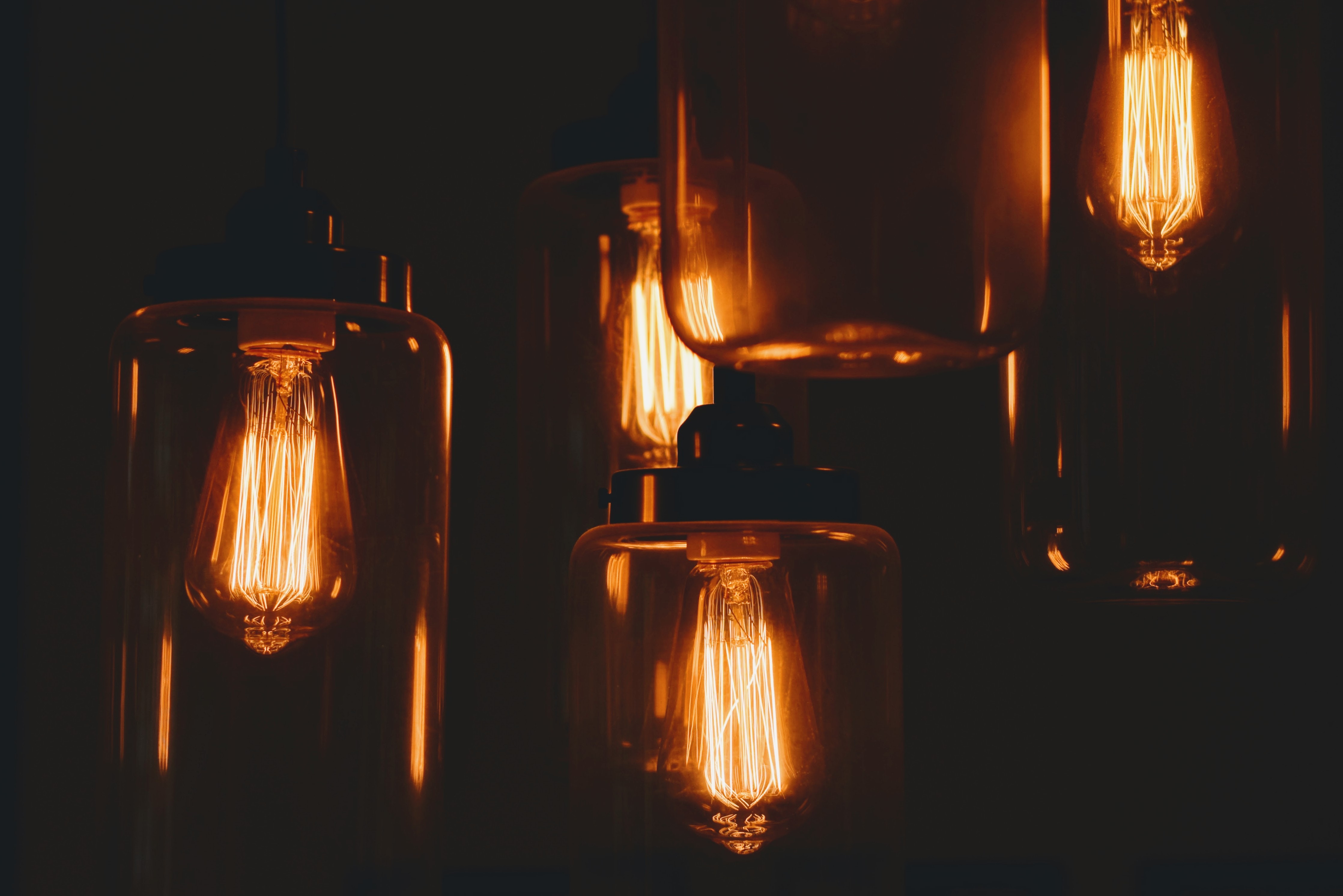 Edison bulbs in glass lanterns HD Wallpaper