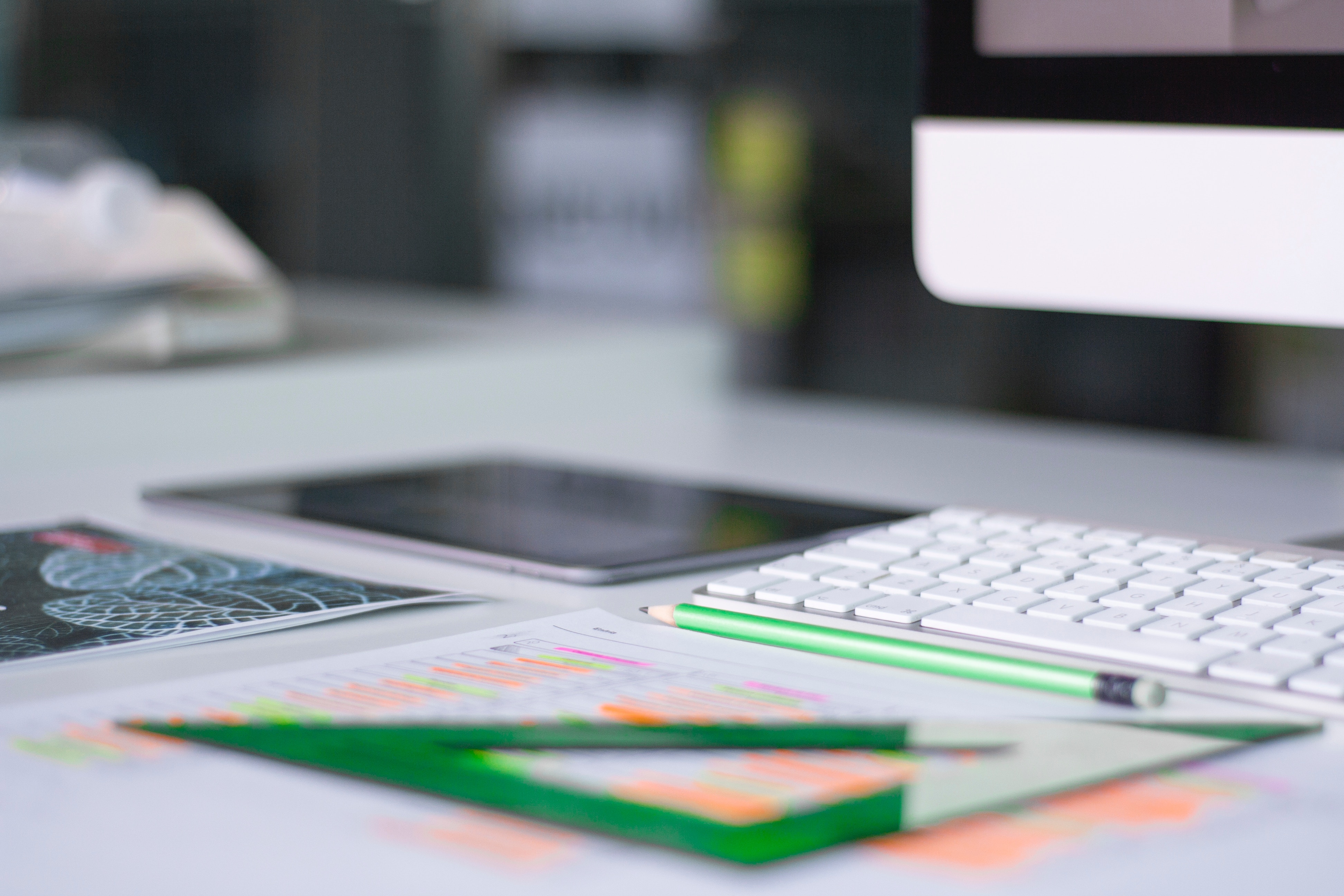 Apple iMac, Keyboard, Tablet, and Design Tools on a Desk HD Wallpaper