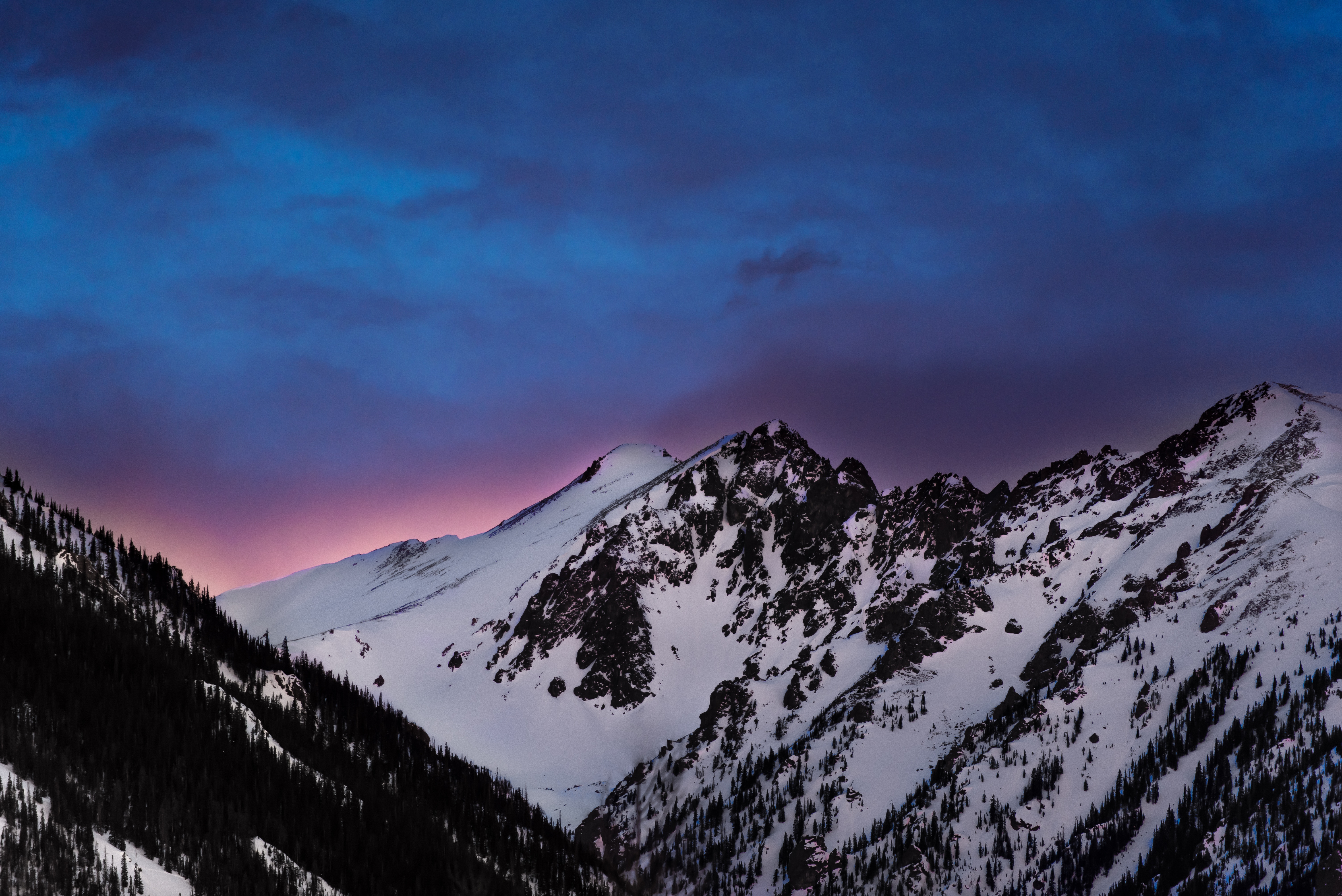 Snowy mountains at dusk with colorful clouds HD Wallpaper
