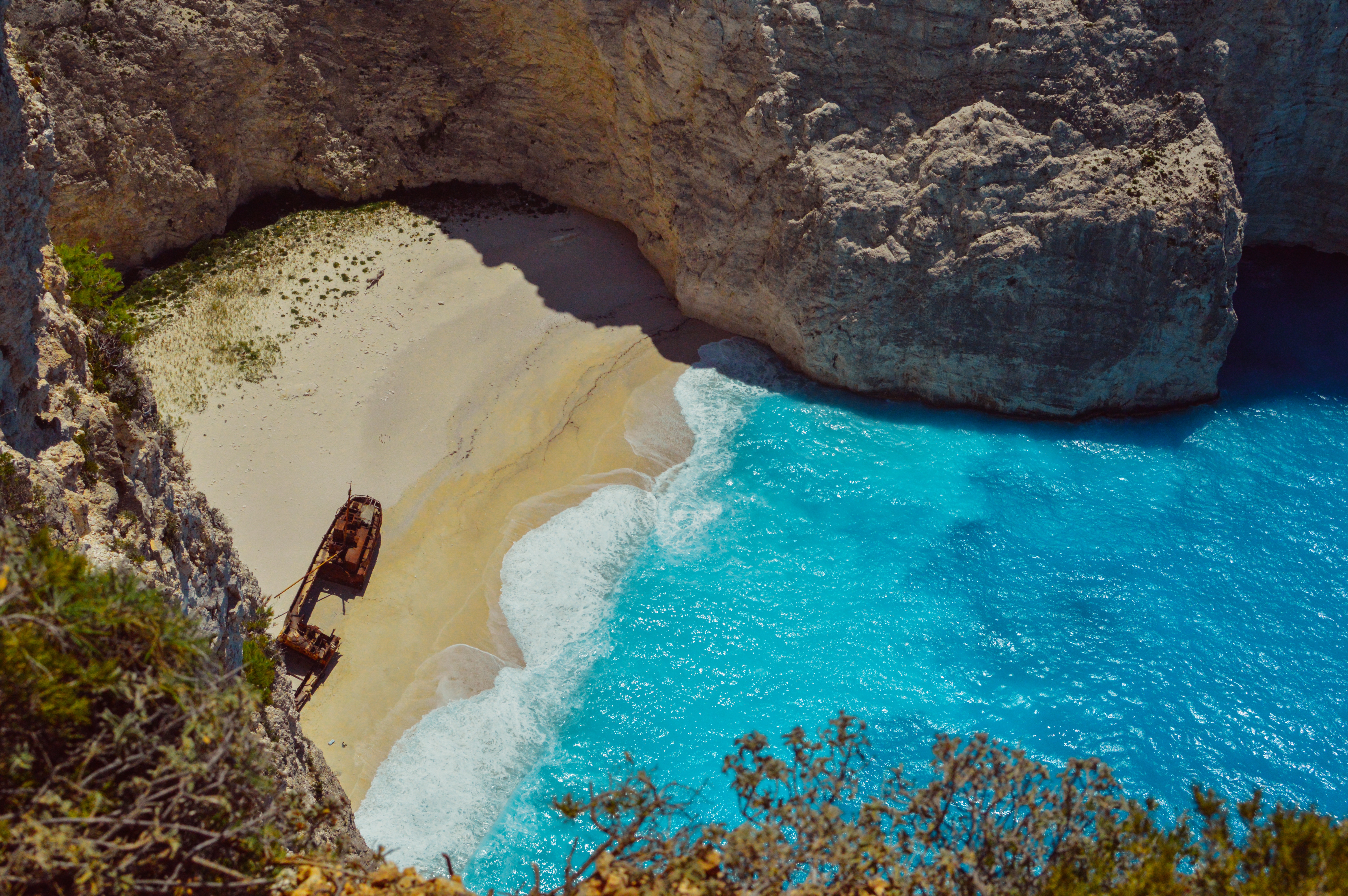 Shipwreck on Secluded Greek Beach with Turquoise Water HD Wallpaper
