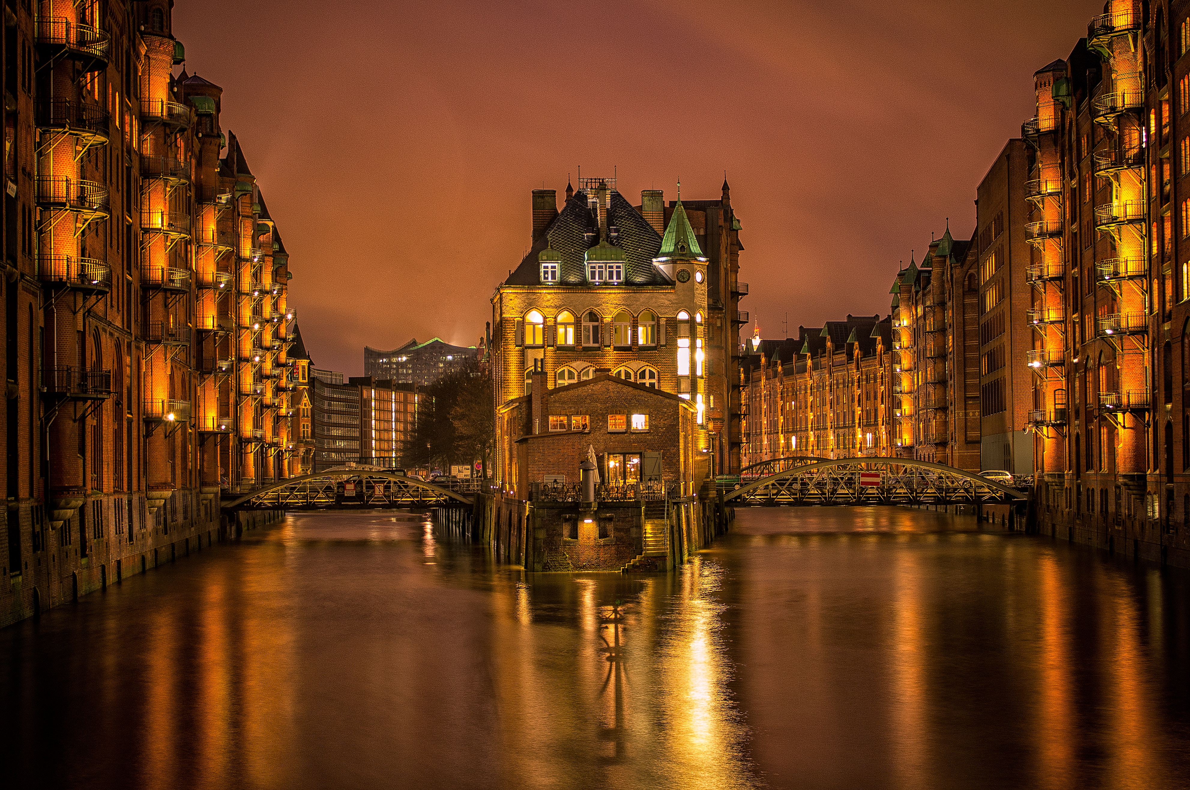 Illuminated Warehouses and Canal at Night in Hamburg HD Wallpaper