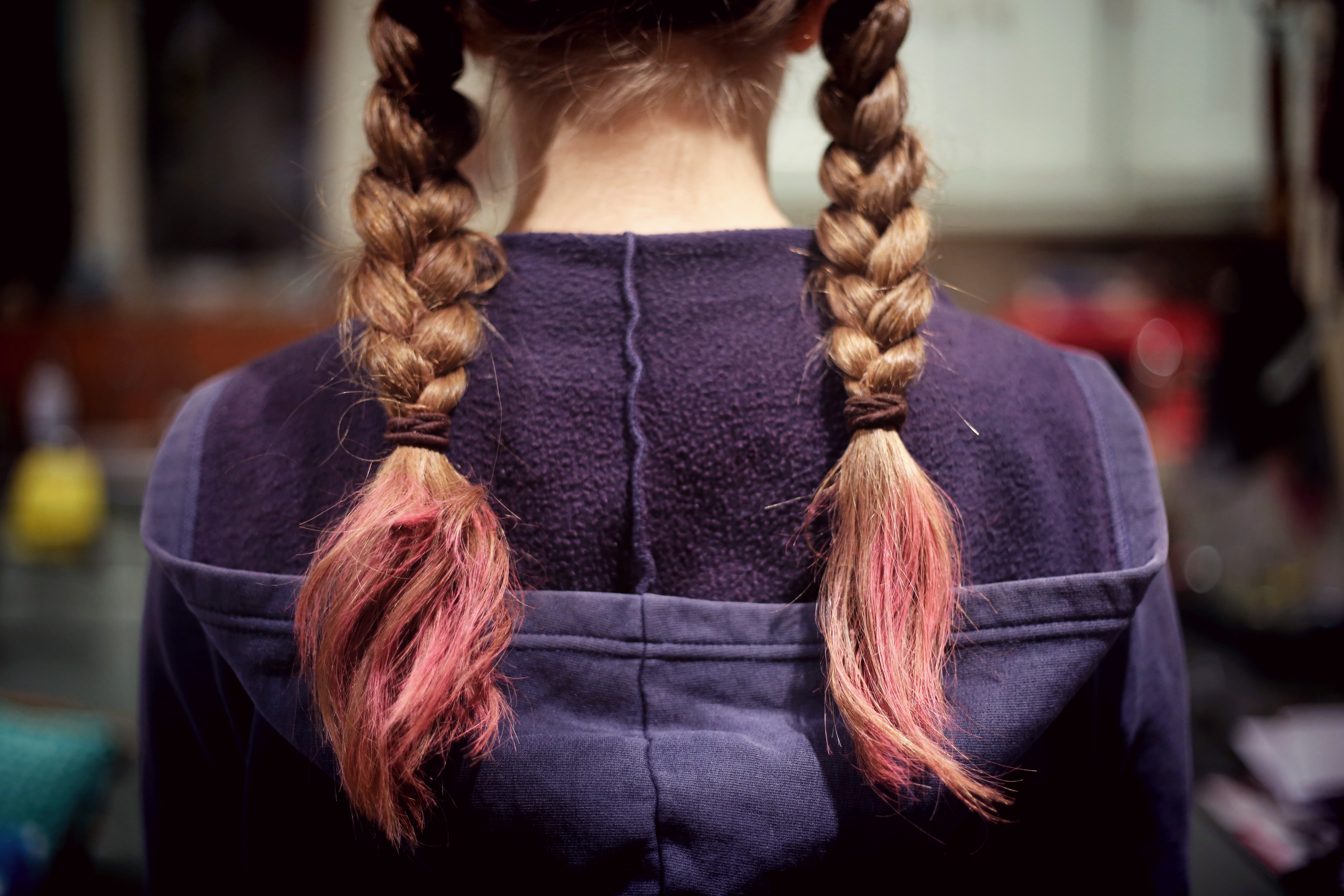 Woman with braided hair dyed pink at the ends HD Wallpaper