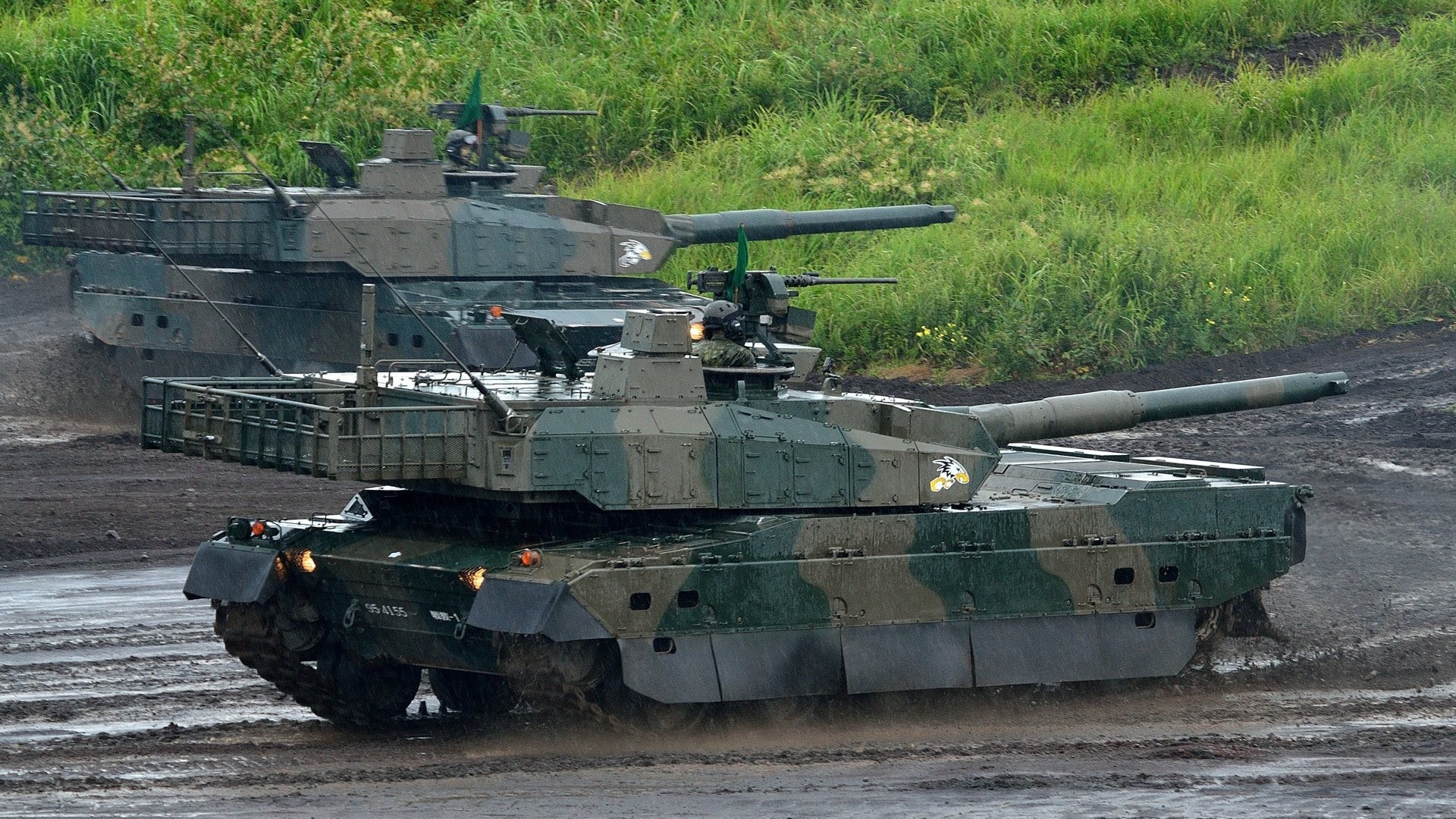Japanese Type 10 tanks on muddy terrain HD Wallpaper