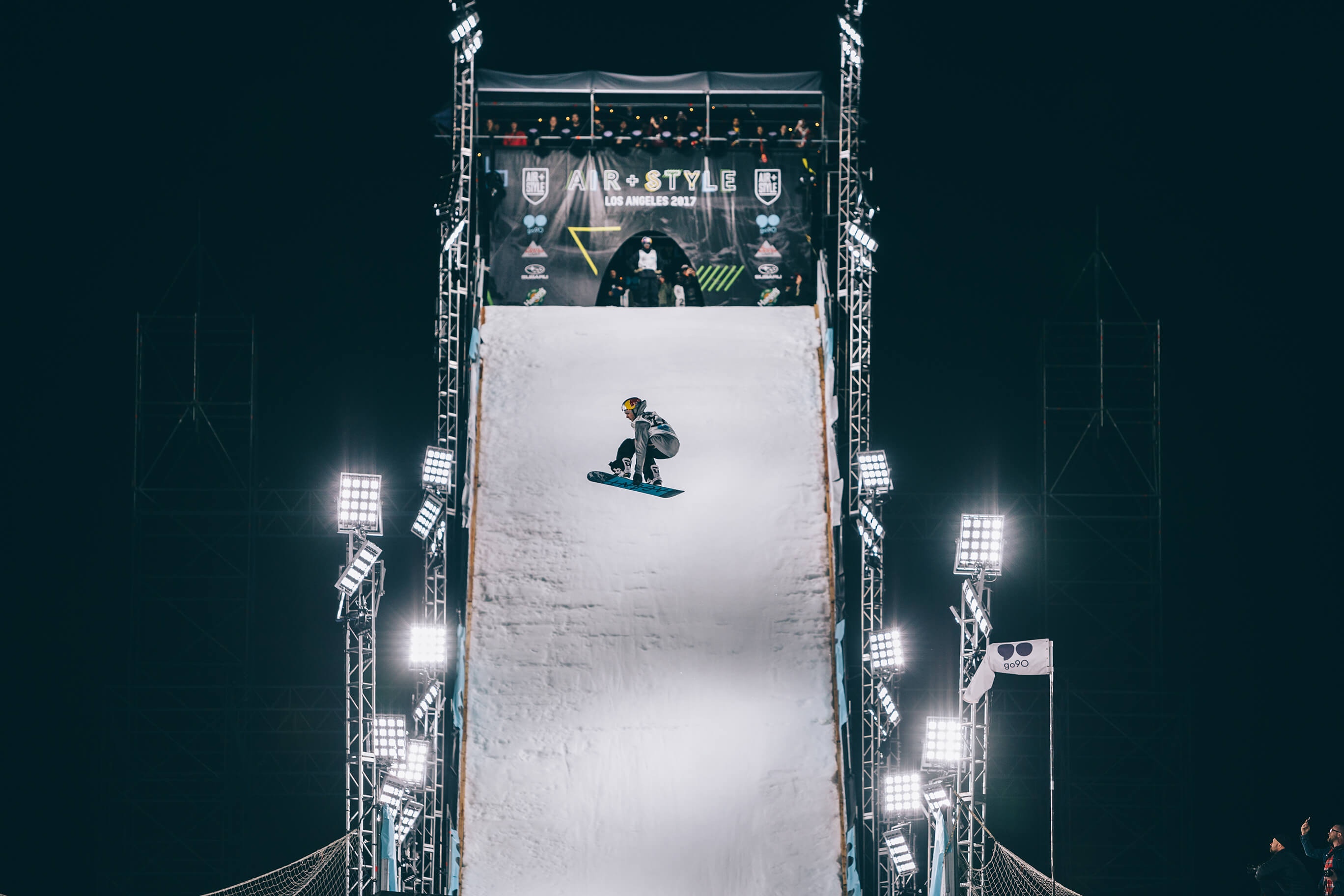 Snowboarder performing a jump at Air + Style Los Angeles 2017 HD Wallpaper