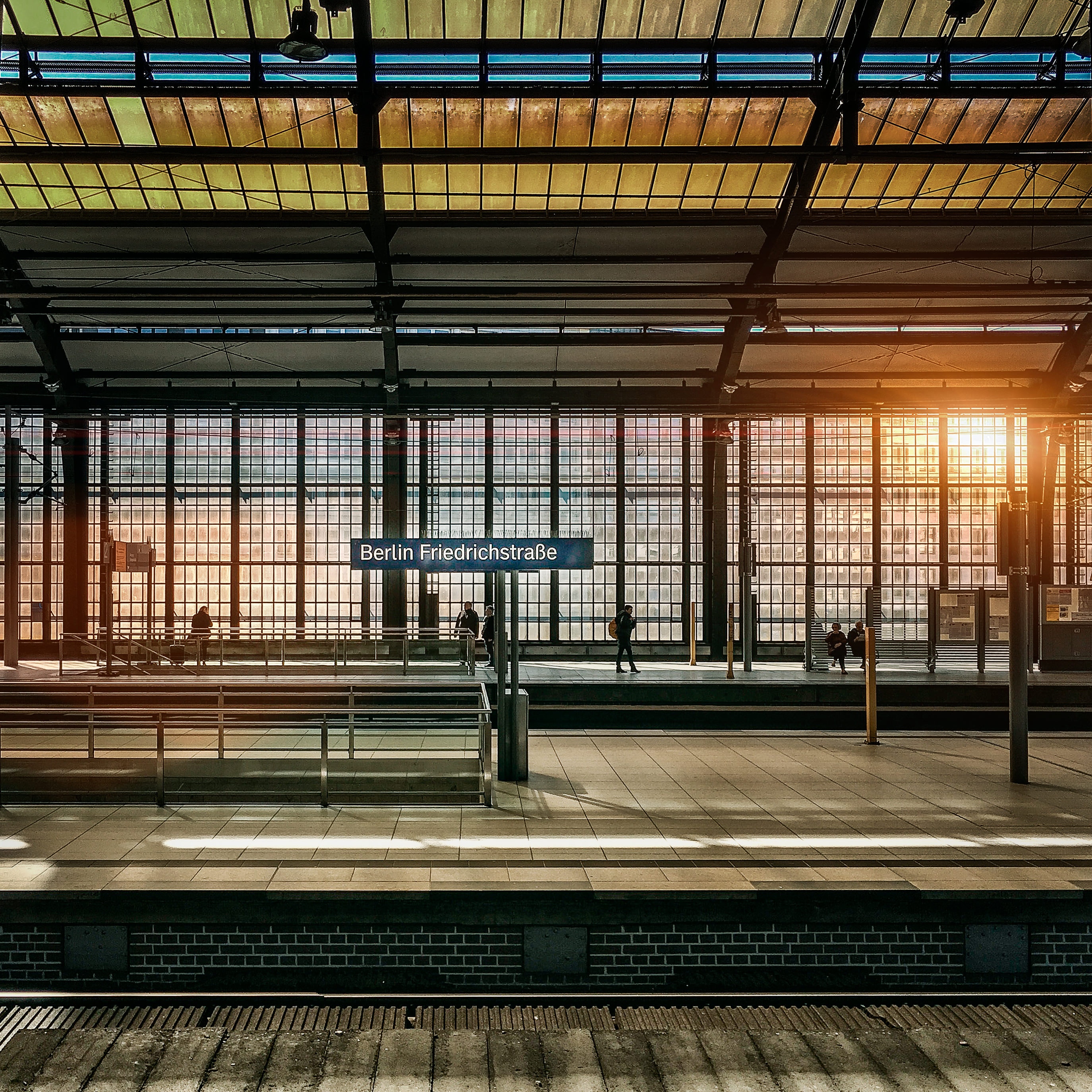 Berlin Friedrichstrasse train station with sunlight HD Wallpaper