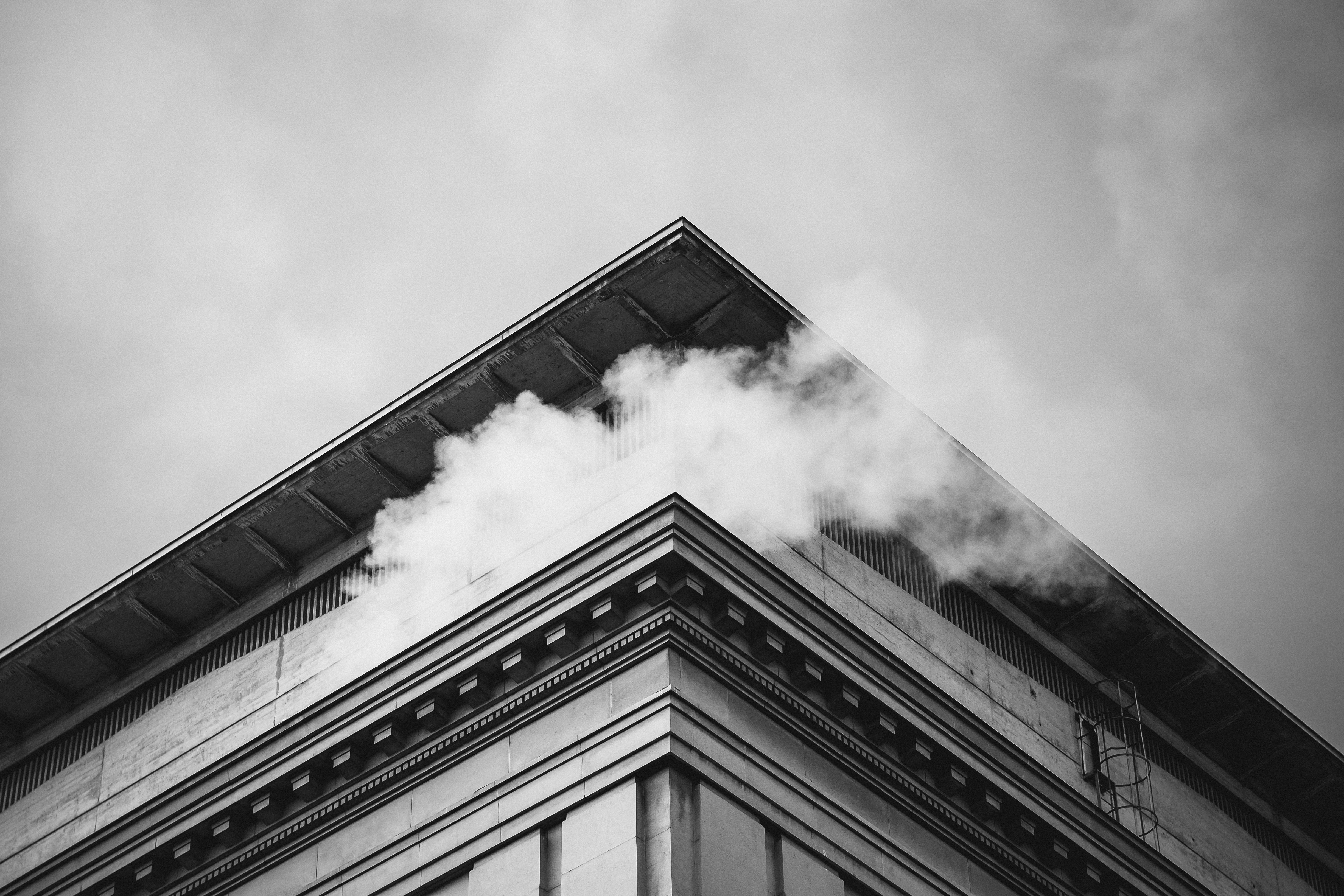 Building corner with smoke in Geneva HD Wallpaper