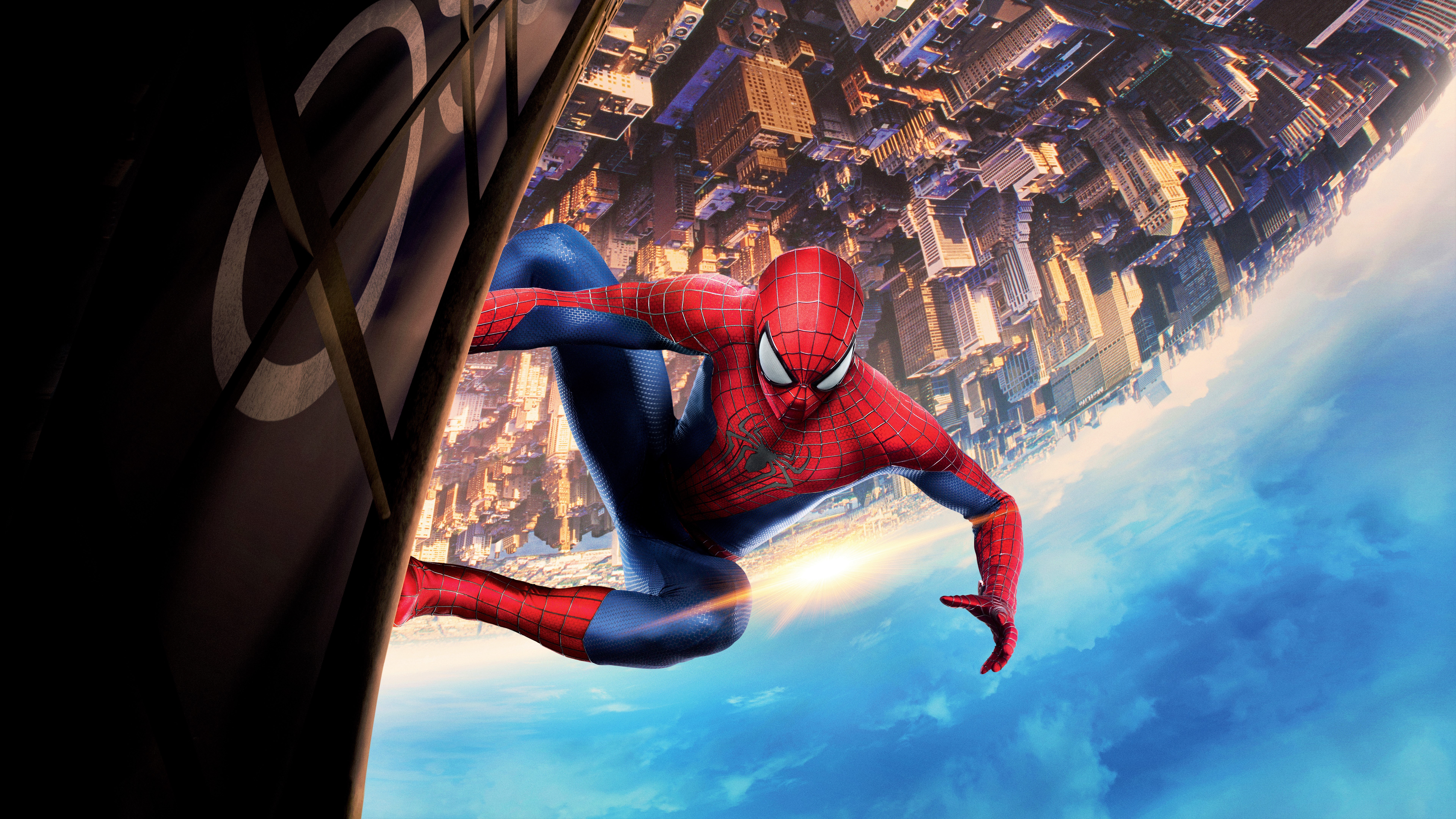 Spider-Man hanging from a building overlooking a city HD Wallpaper