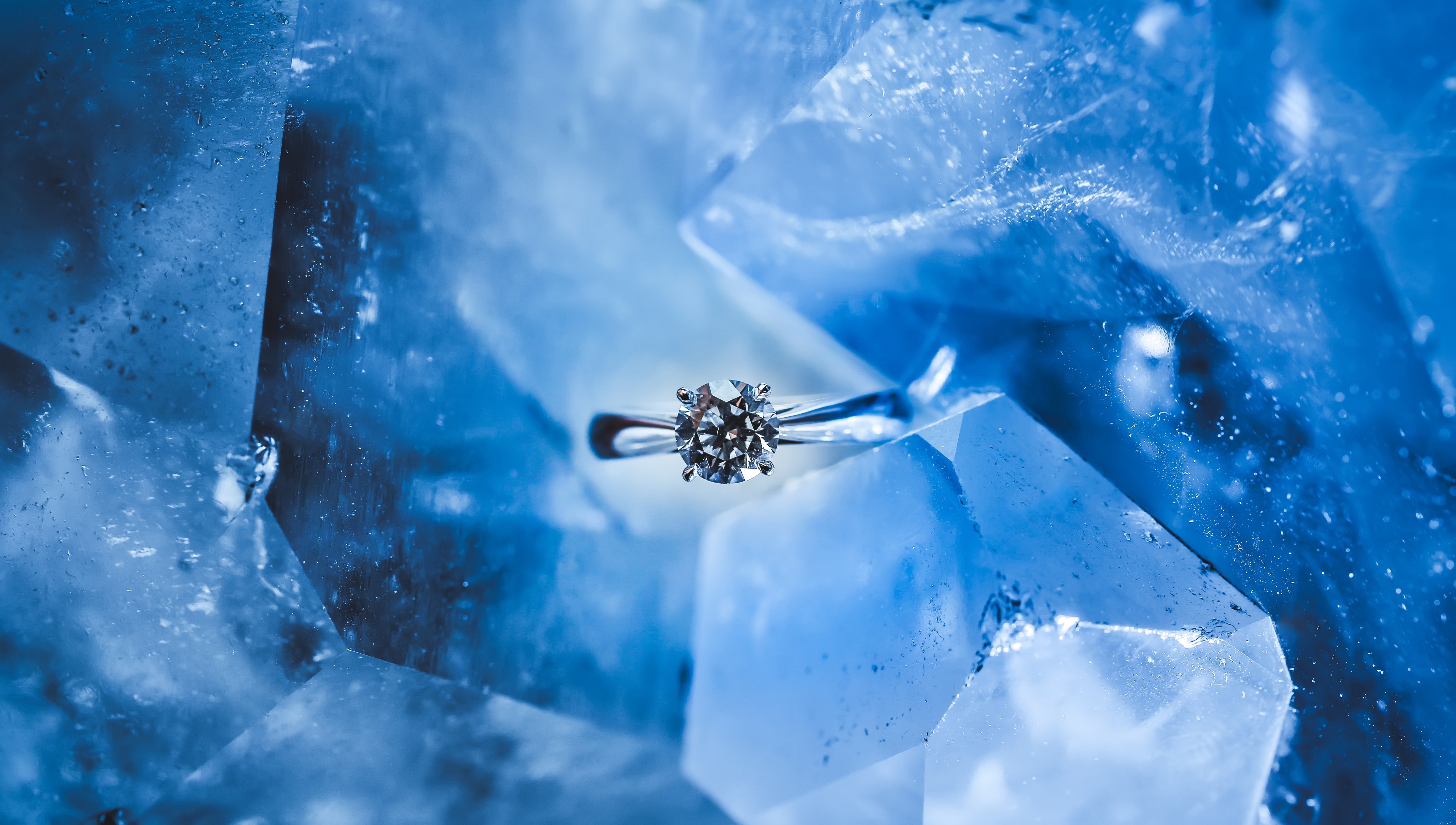 Diamond Wedding Ring on Blue Ice Crystals HD Wallpaper