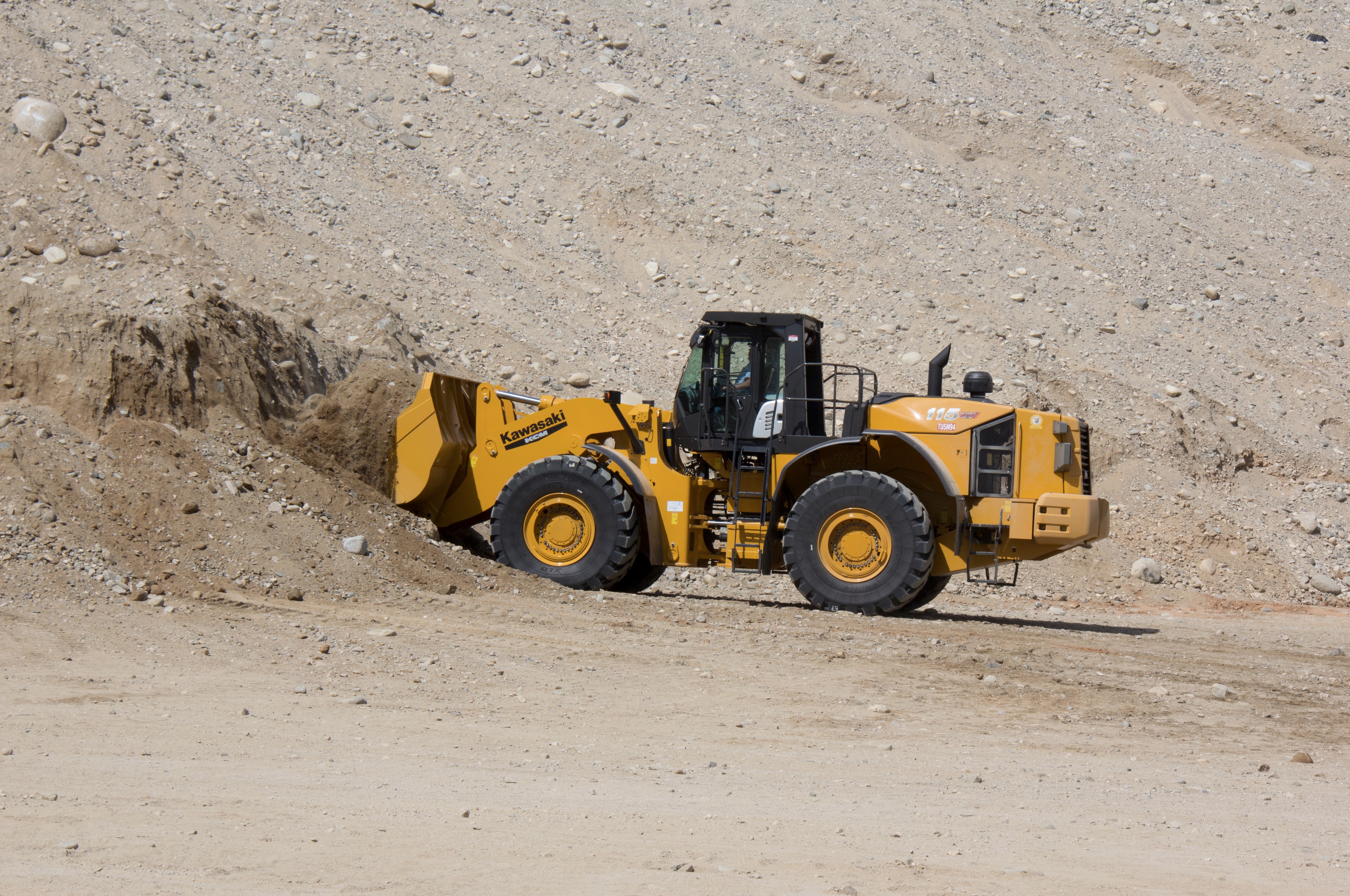 Kawasaki 115Z7 Yellow Wheel Loader in Action HD Wallpaper