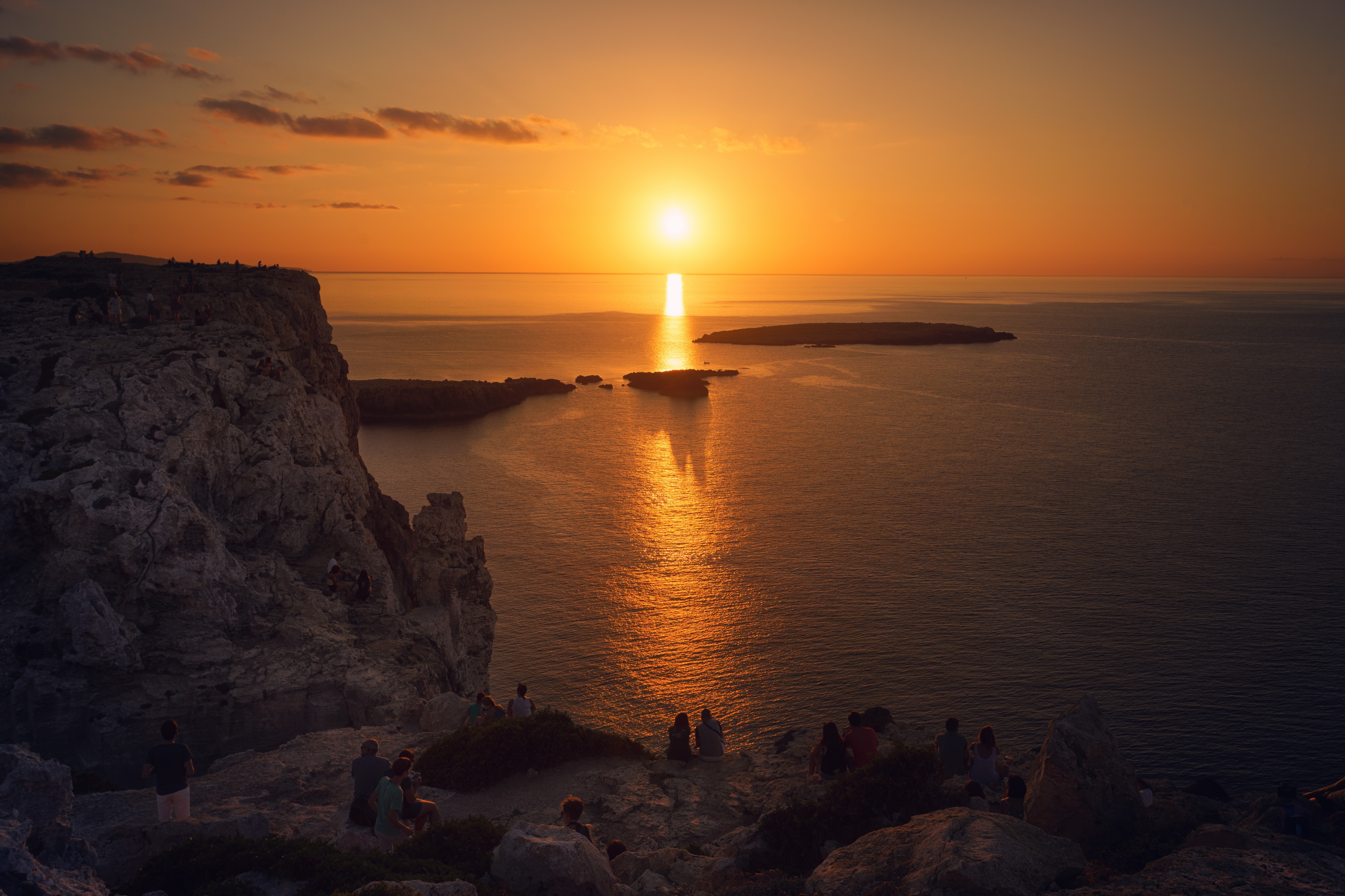 Sunset over the sea from a cliff in Minorca, Spain HD Wallpaper