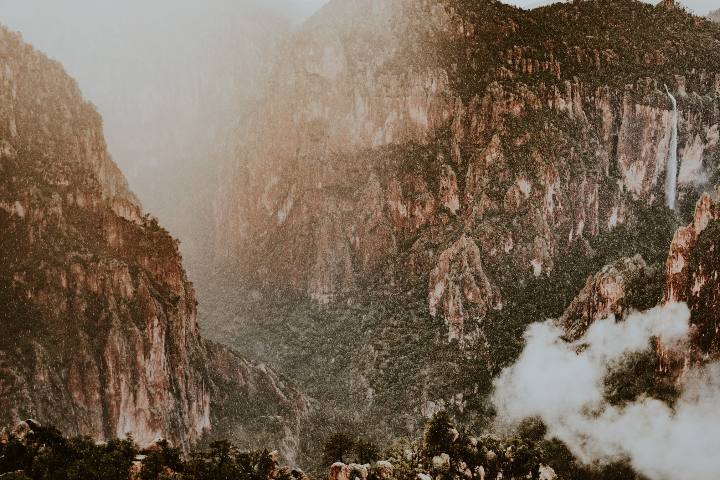 Rainy mountain landscape with cliffs and fog HD Wallpaper