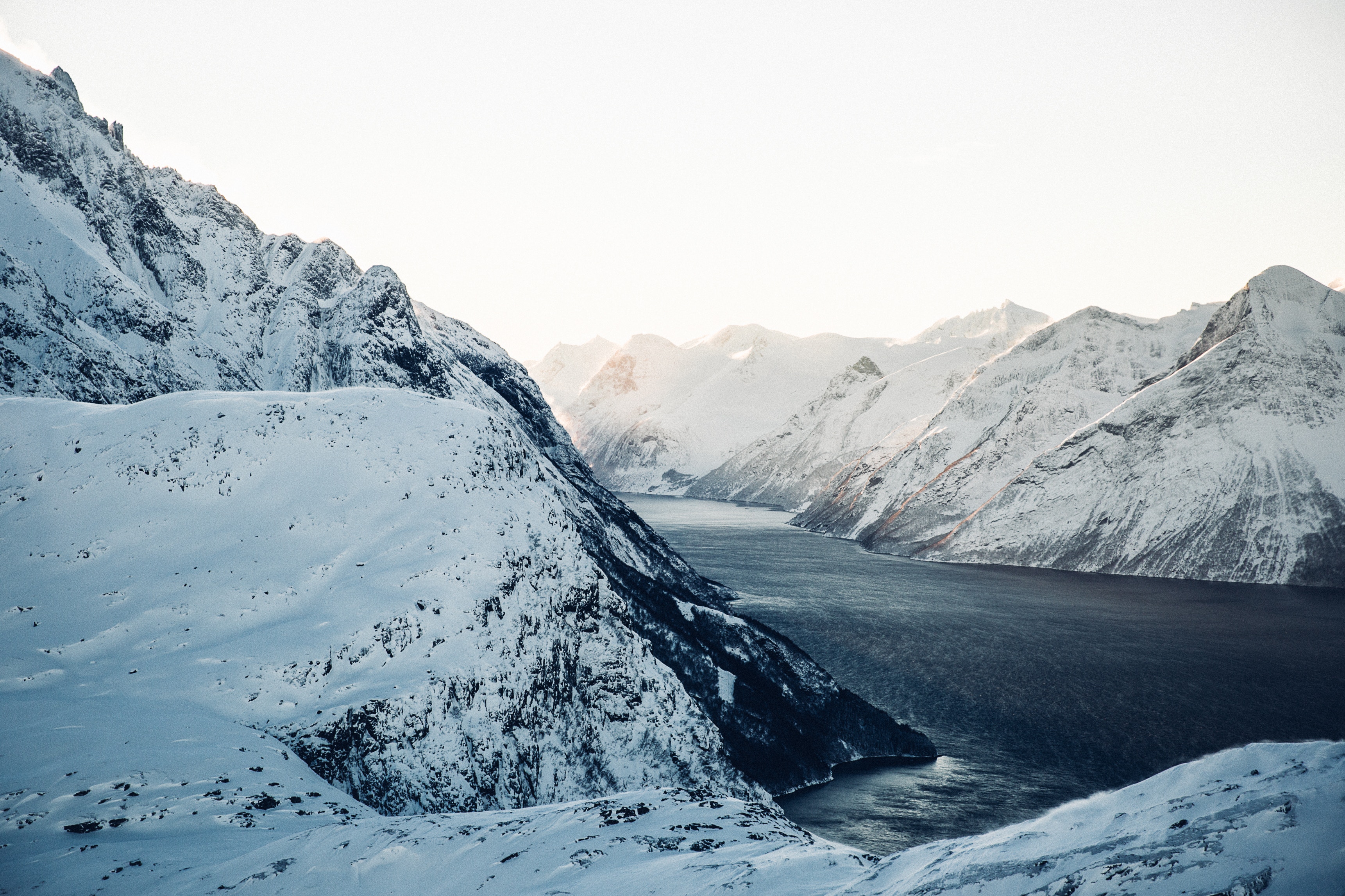 Snowy mountains and a fjord in Norway HD Wallpaper