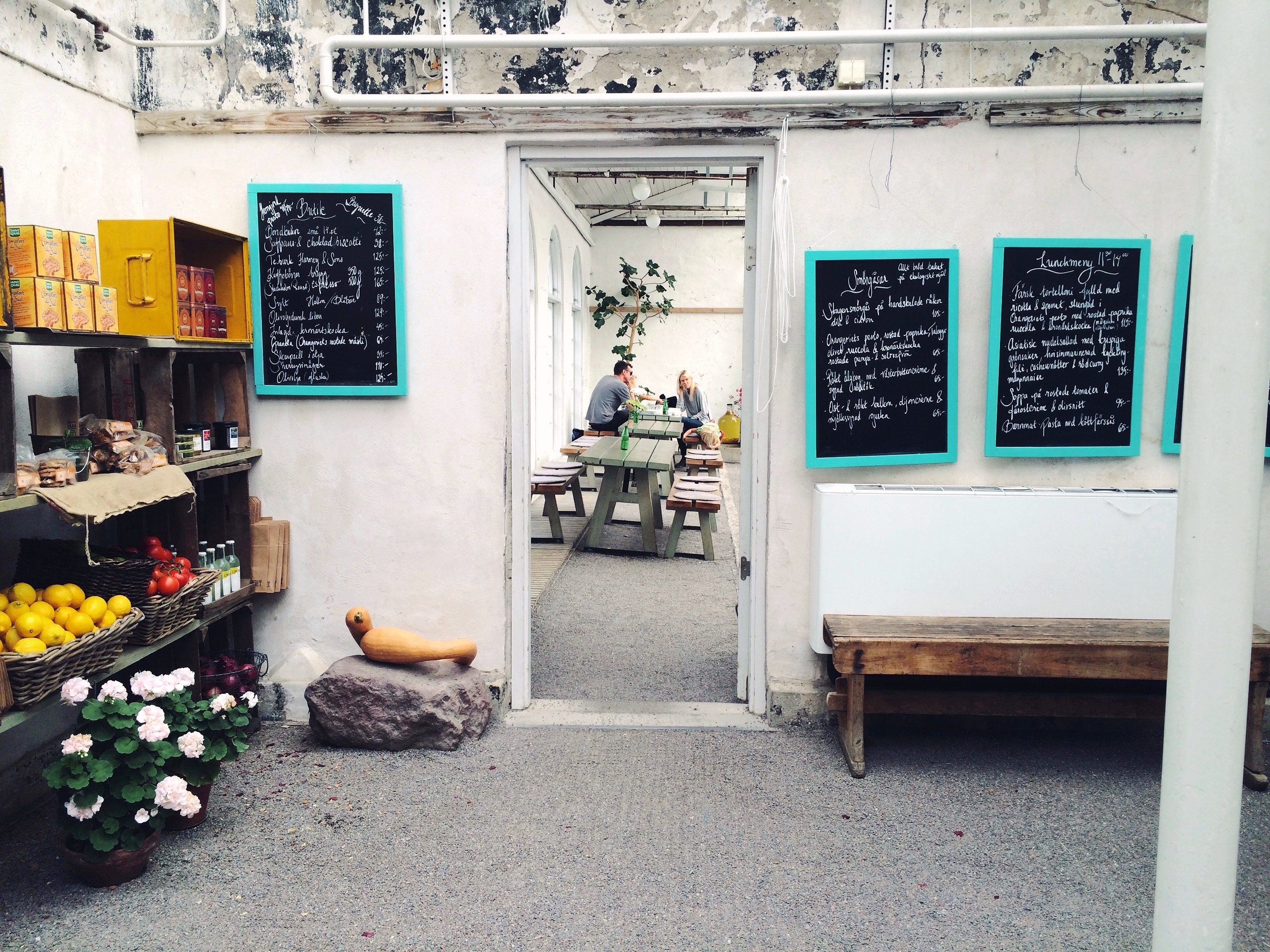 Cafe interior with chalkboards and produce display HD Wallpaper