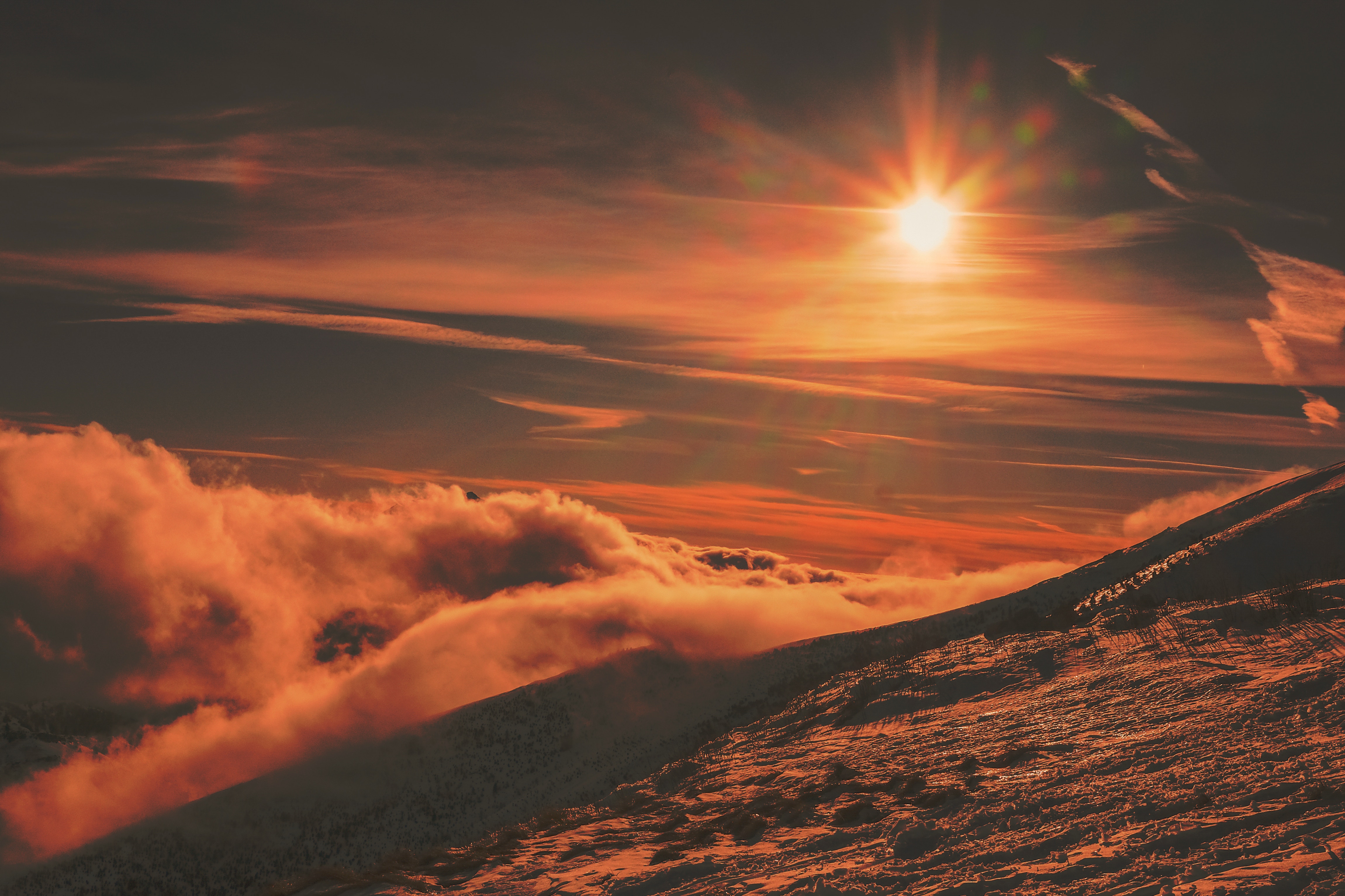 Sunset over snowy mountains in Italy HD Wallpaper