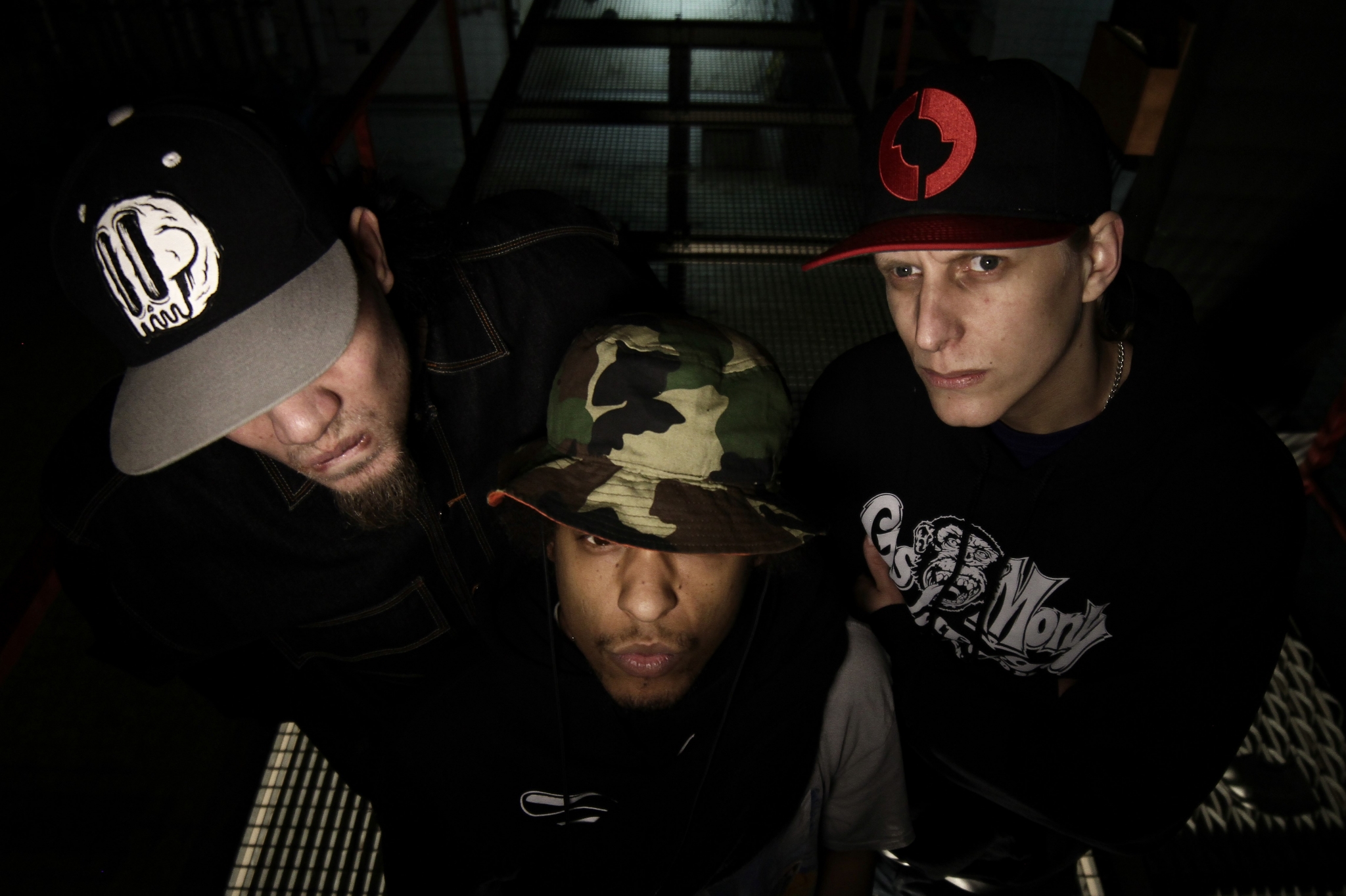Three men wearing hats and hoodies HD Wallpaper