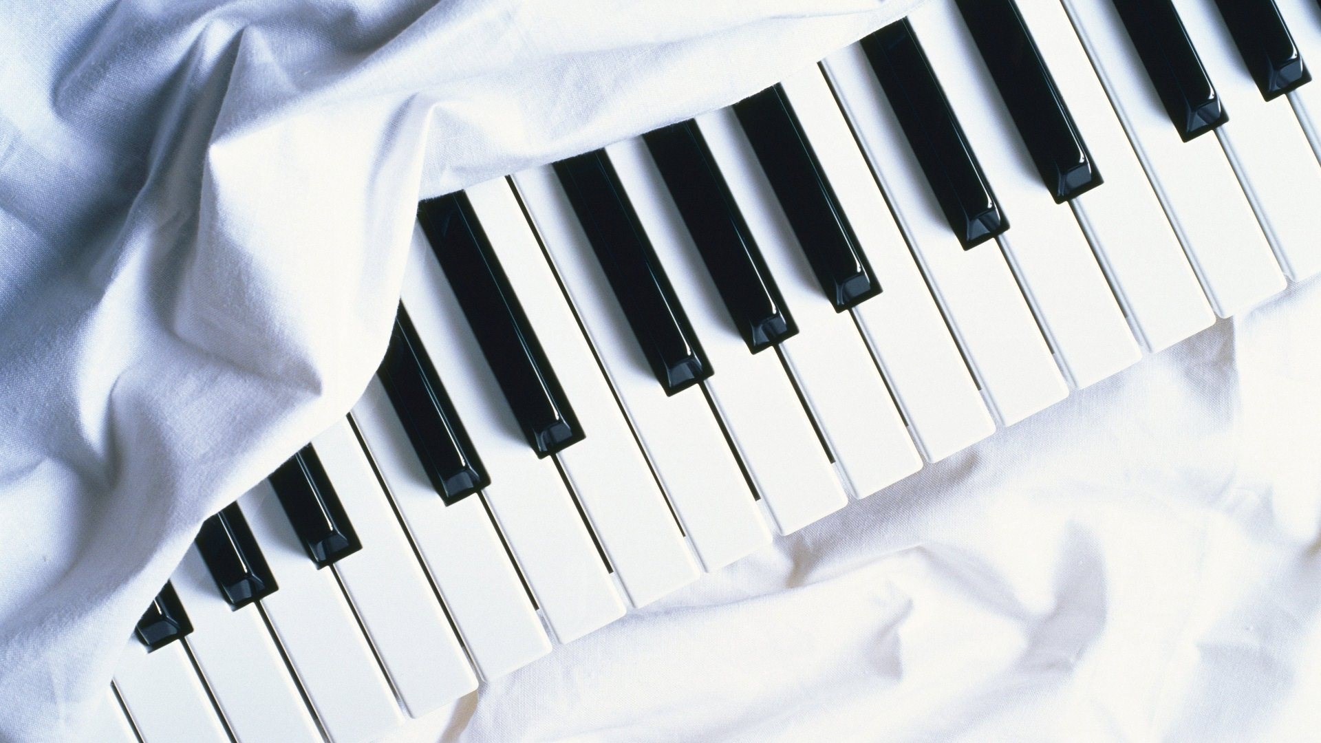 Piano Keys Covered by White Fabric HD Wallpaper