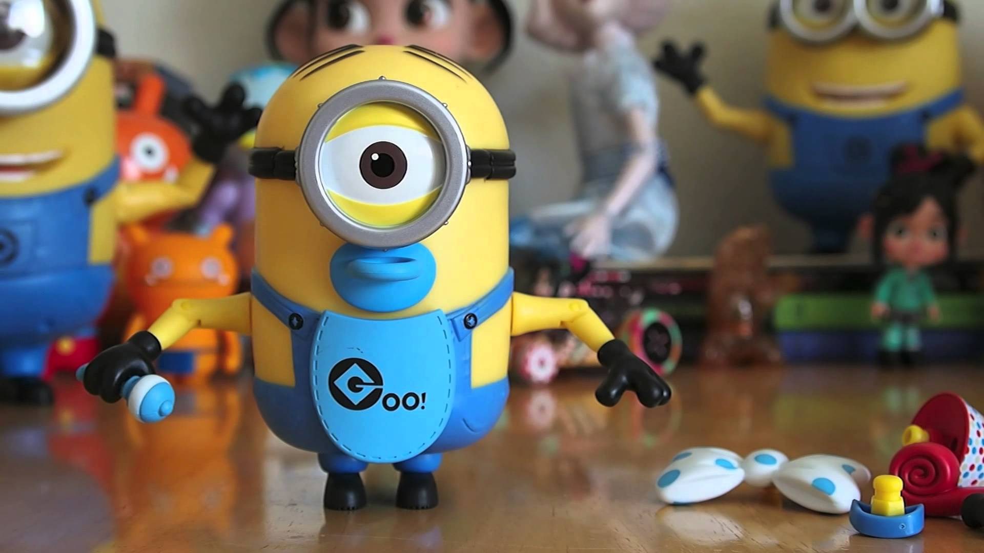 Minion toy with other toys in the background HD Wallpaper