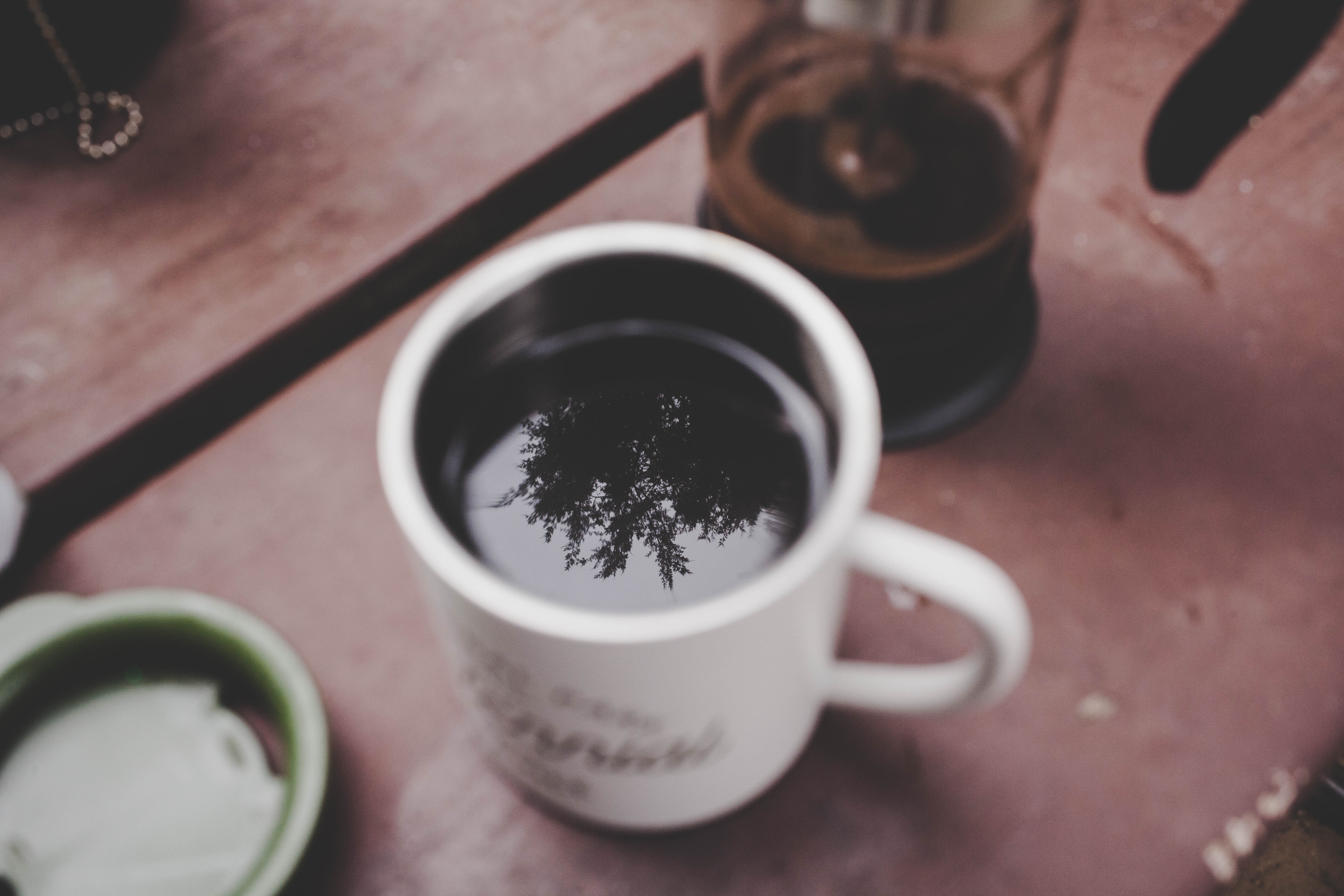Coffee mug with reflection and French press HD Wallpaper