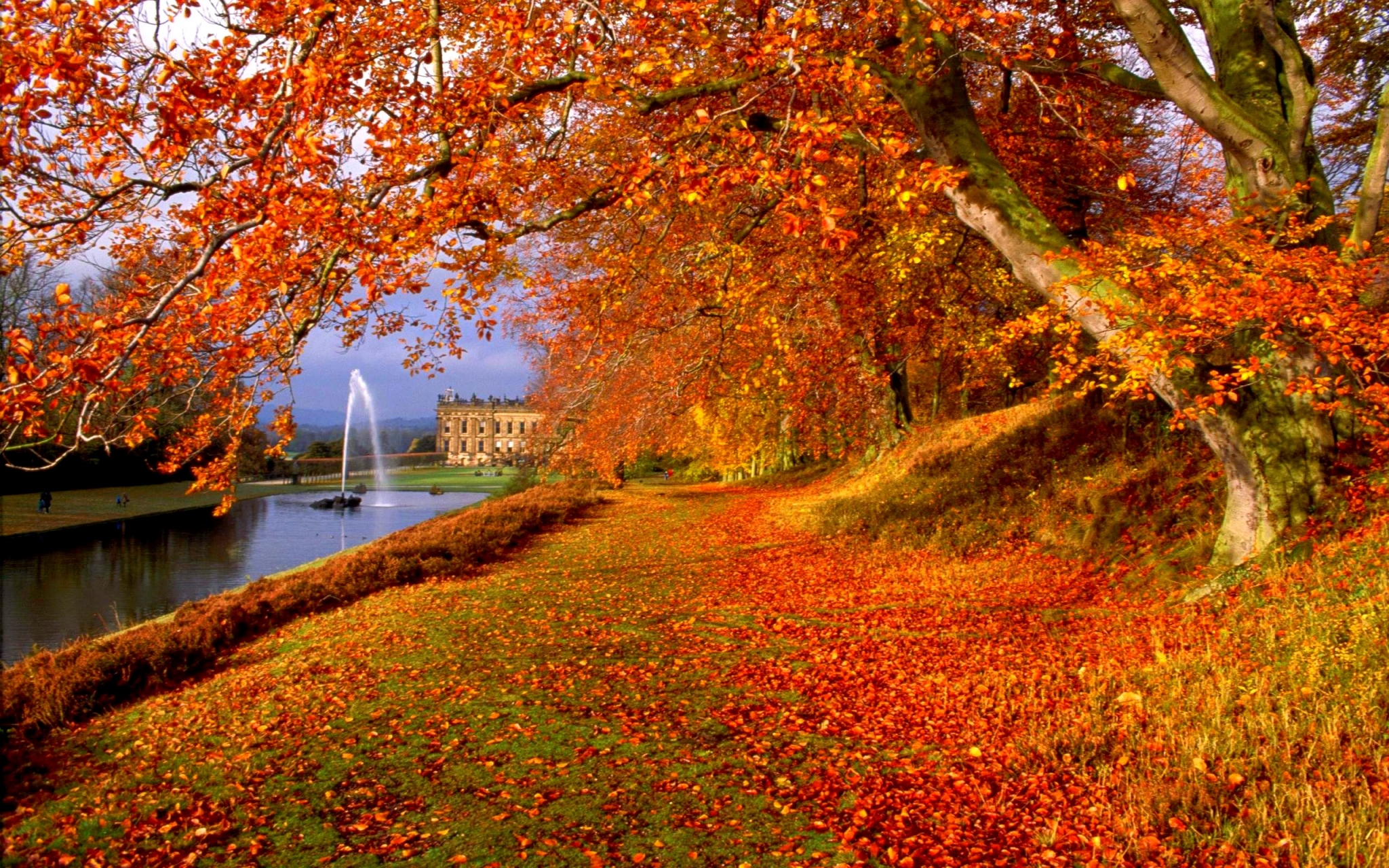 Autumn park with a mansion and fountain HD Wallpaper