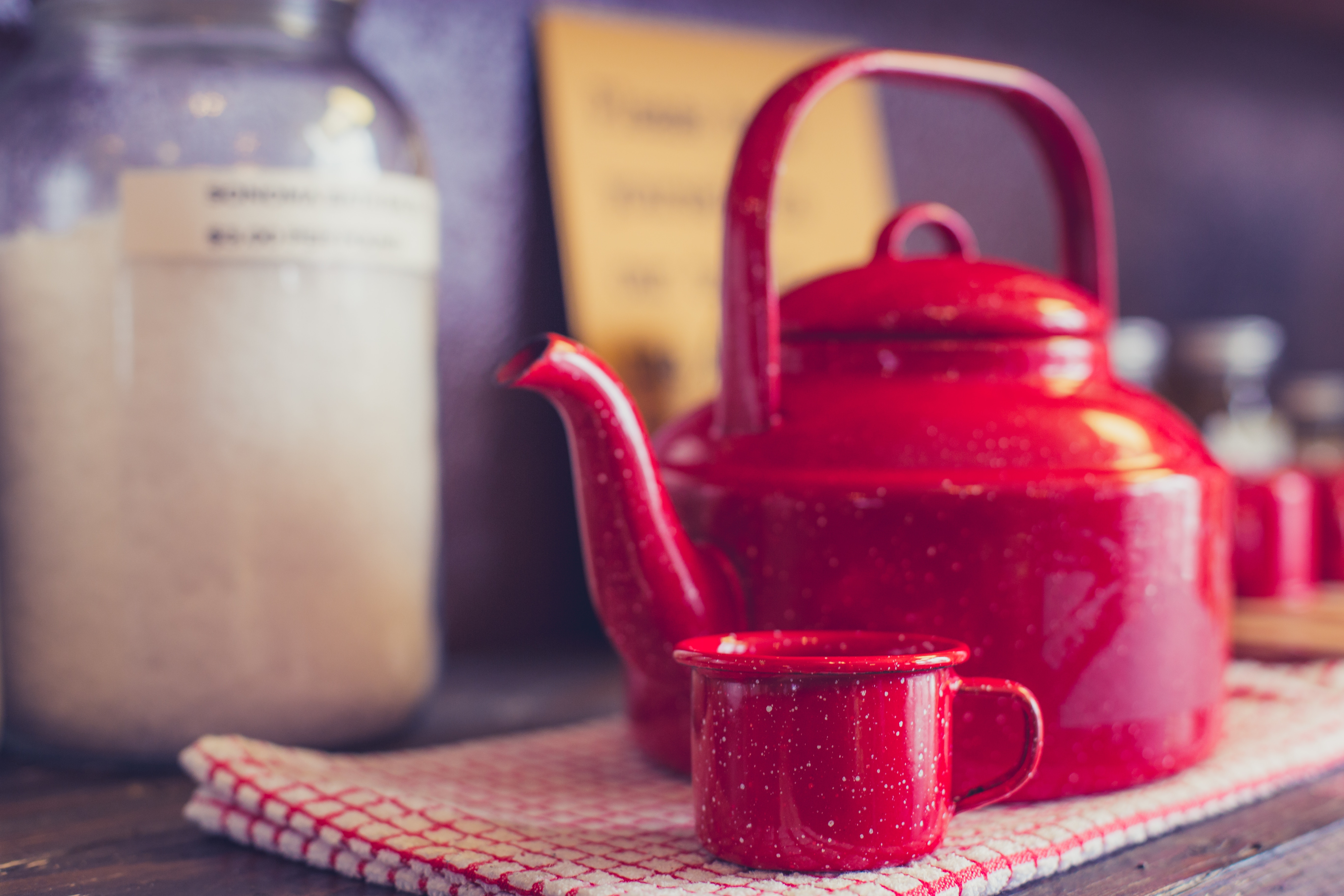 Rustic Red Metal Teapot and Cup on Counter HD Wallpaper