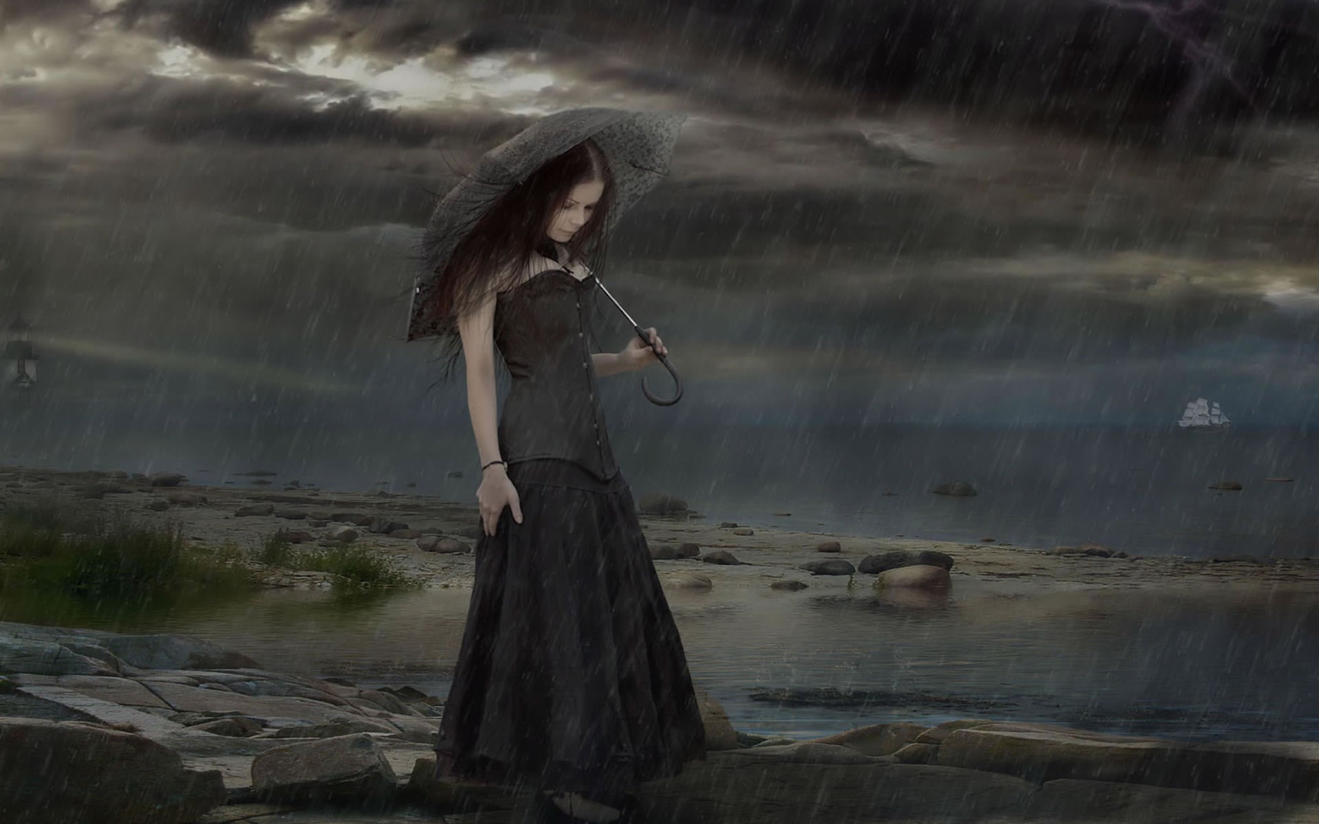 Woman with umbrella in the rain on a rocky shore HD Wallpaper