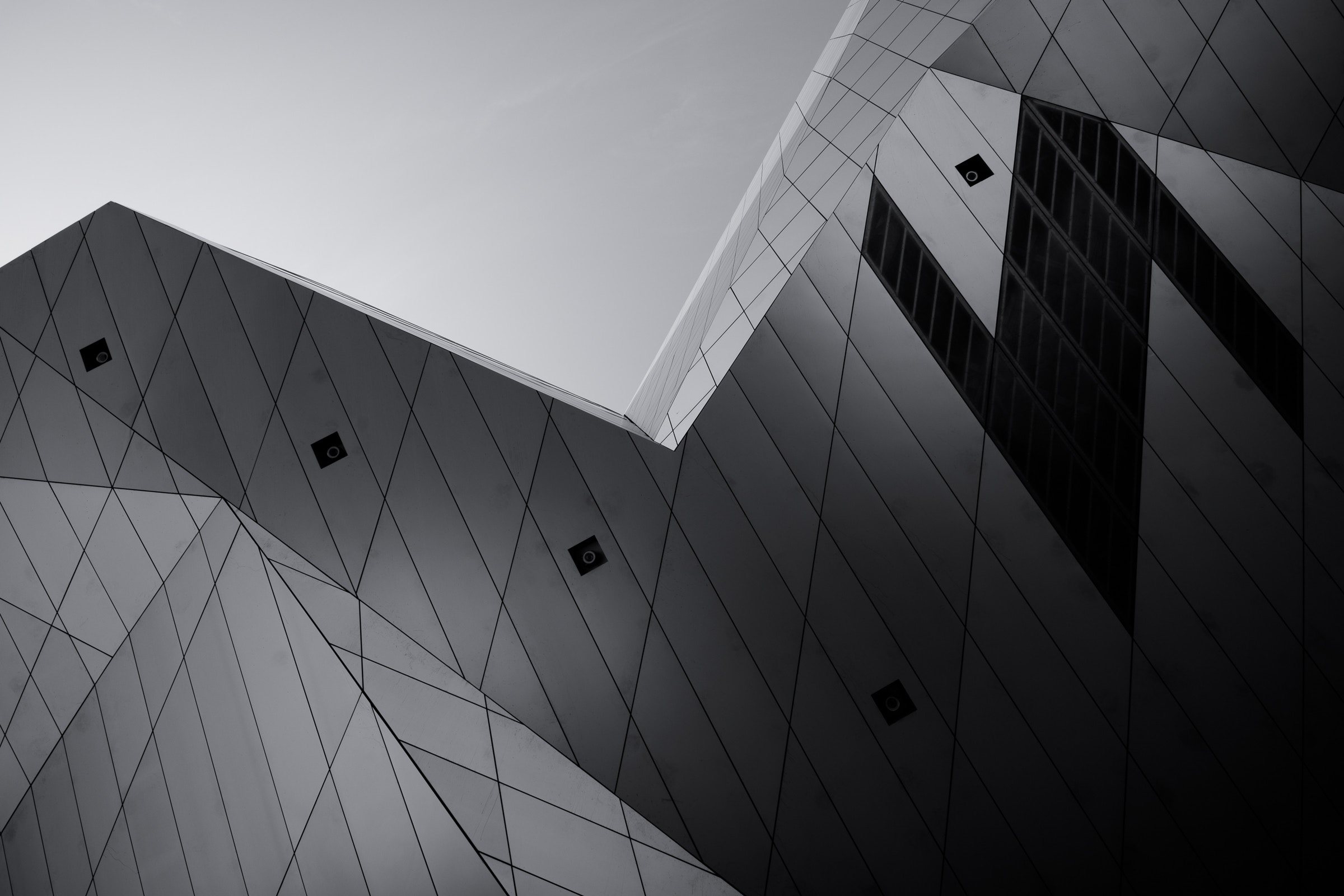 Abstract geometric architecture against a clear sky HD Wallpaper