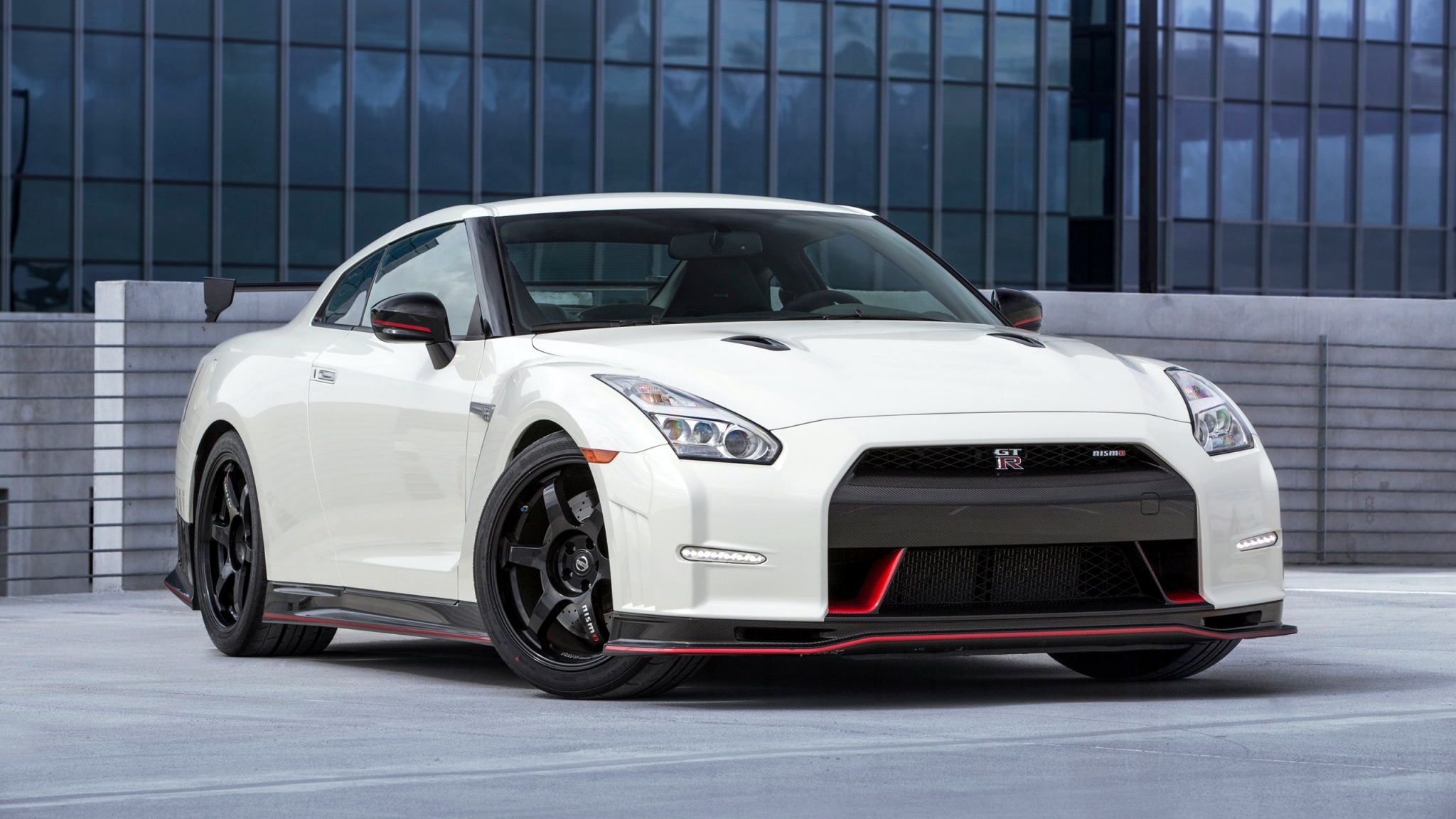 White Nissan GT-R NISMO parked outdoors HD Wallpaper