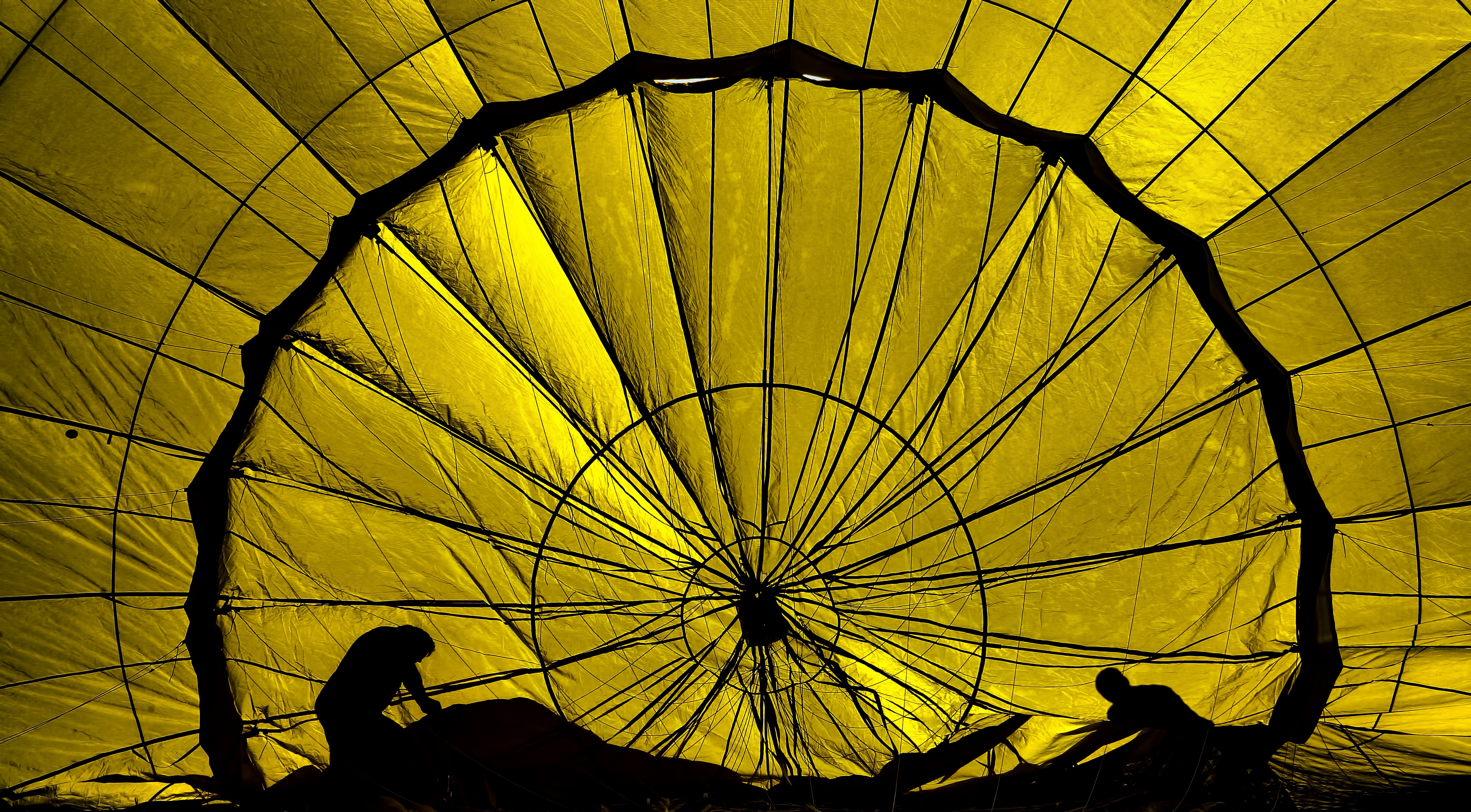 Inside a yellow hot air balloon with people HD Wallpaper