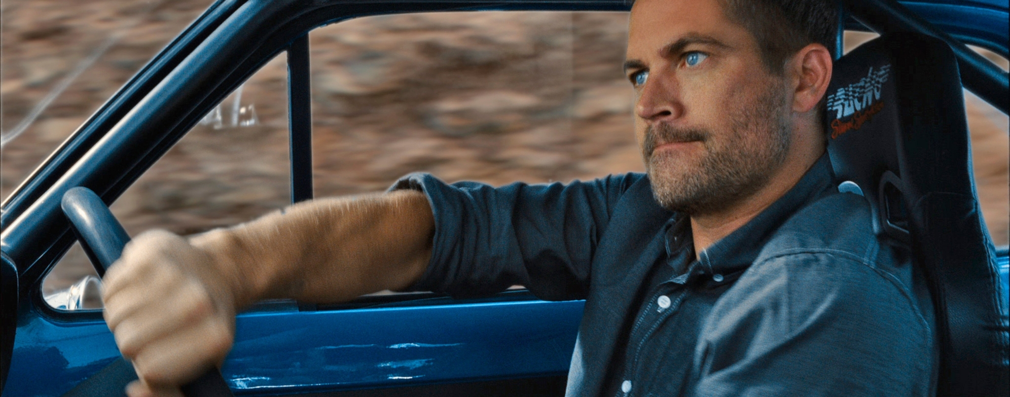 Paul Walker driving a car HD Wallpaper