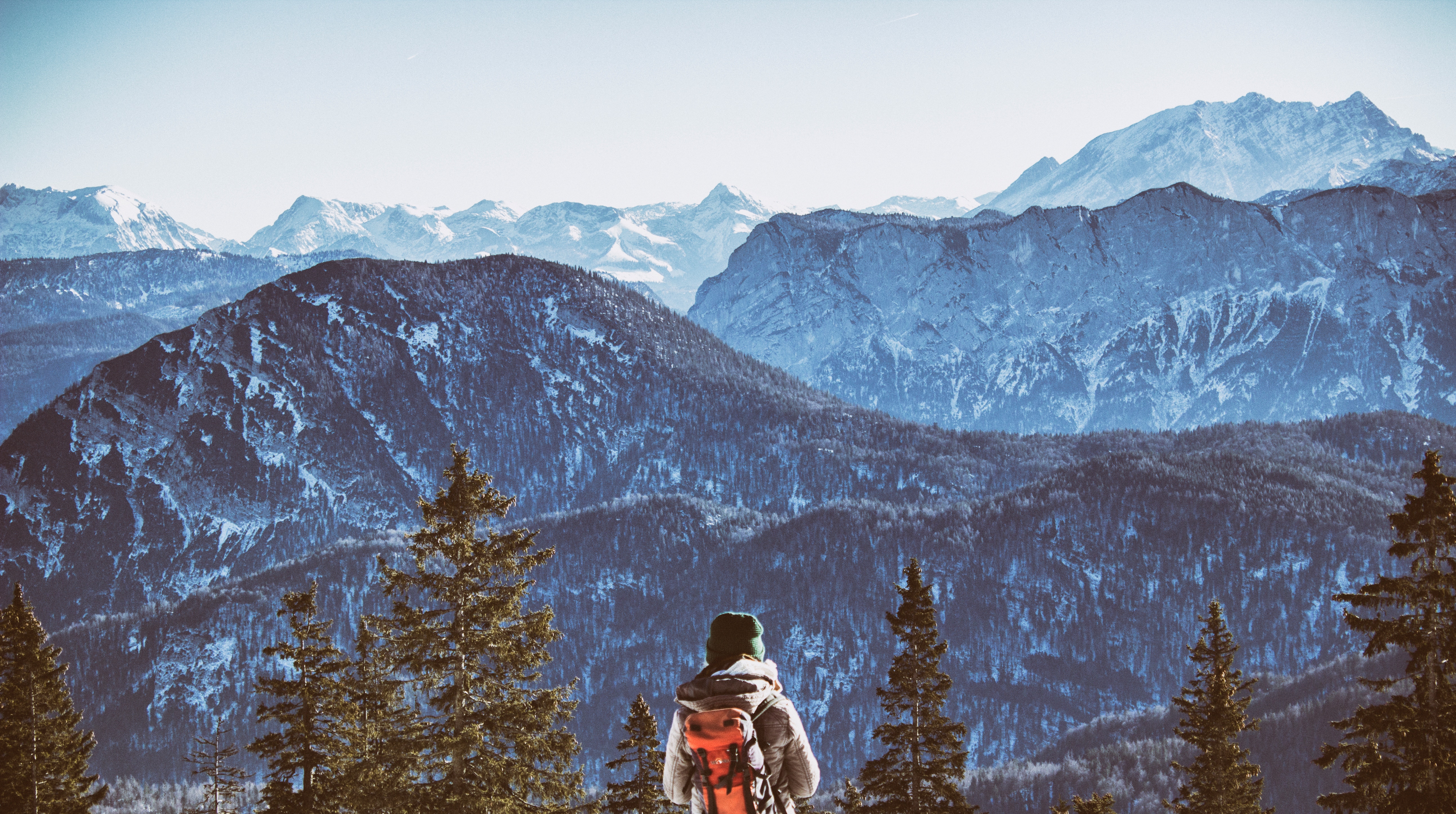 Person with backpack in Bavarian Alps HD Wallpaper