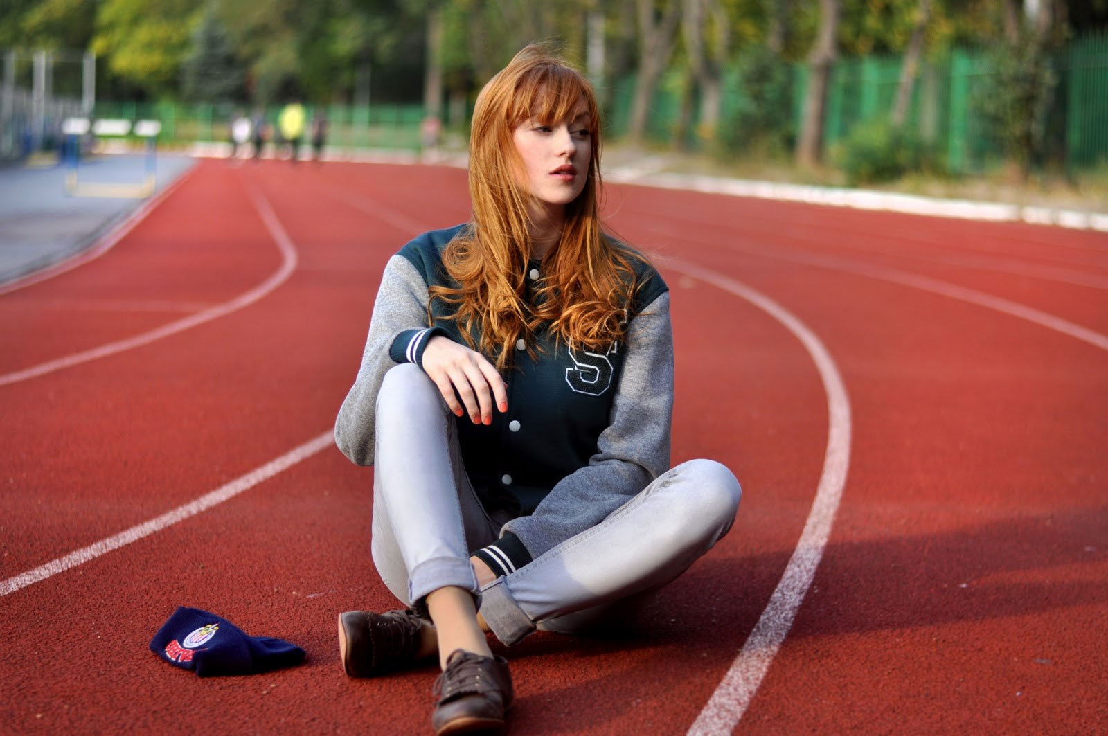 Alina Kovalenko on a running track HD Wallpaper