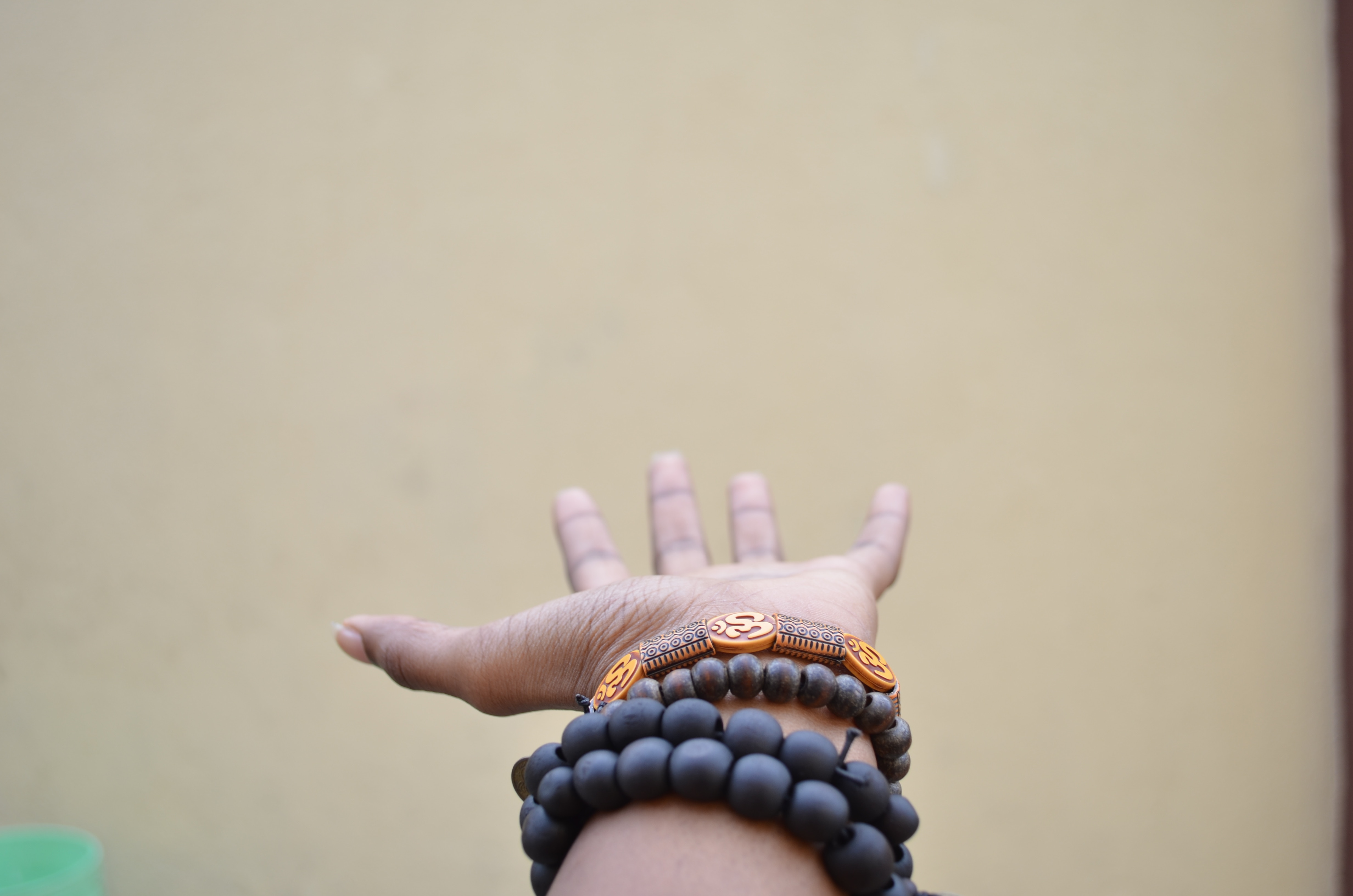 Hand with bracelets HD Wallpaper