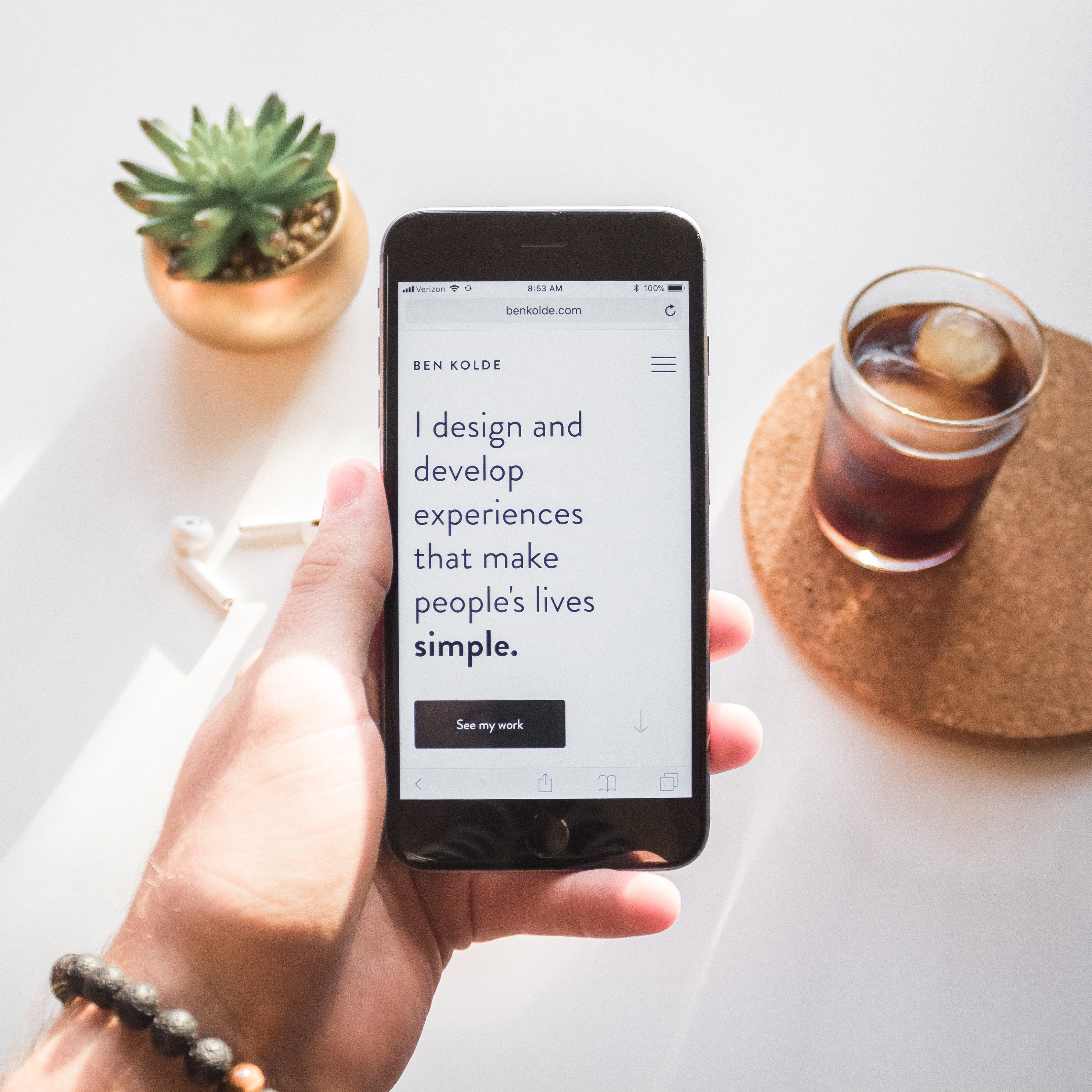 Ben Kolde website on iPhone with succulent and iced coffee HD Wallpaper