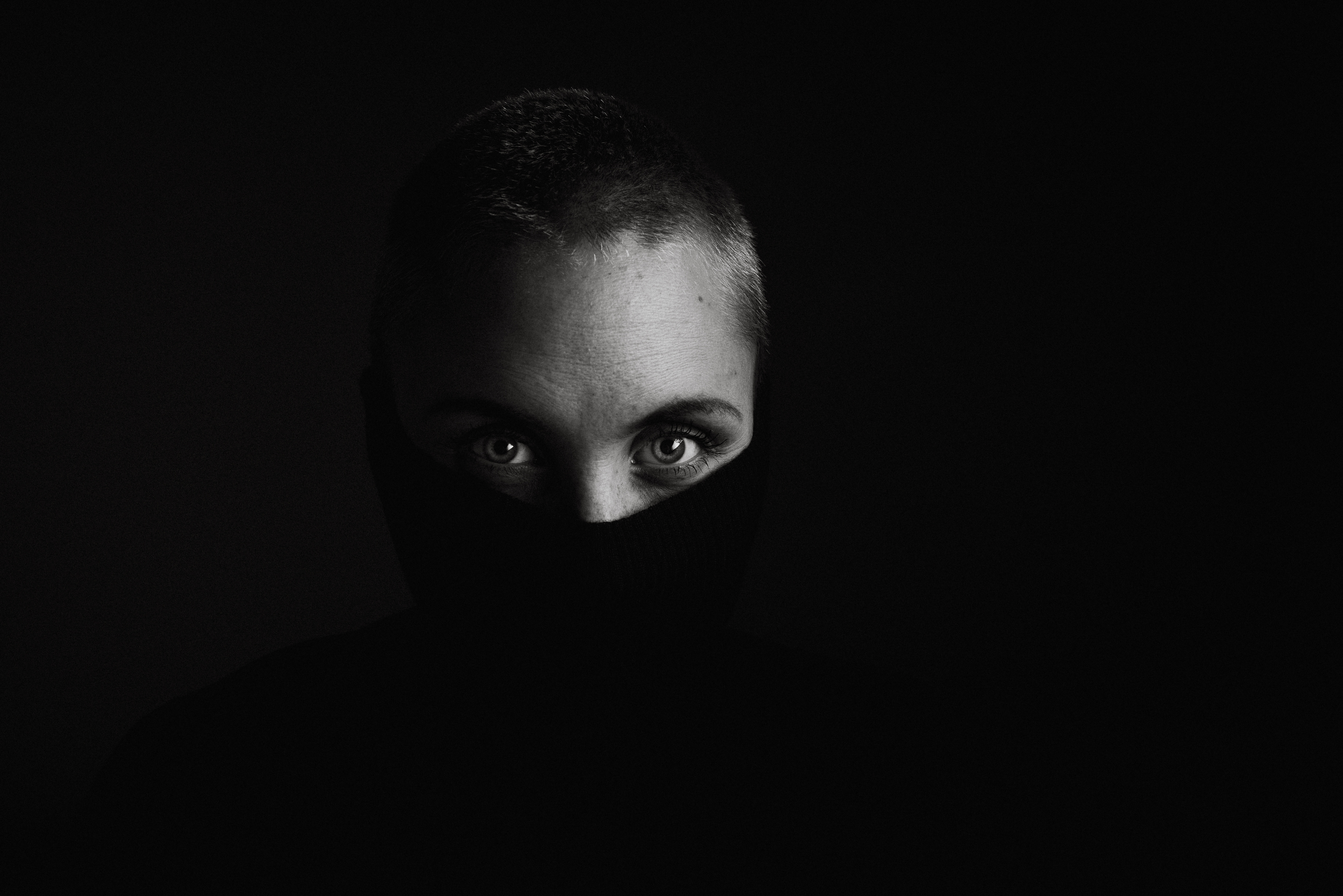 Woman with short hair wearing a turtleneck HD Wallpaper