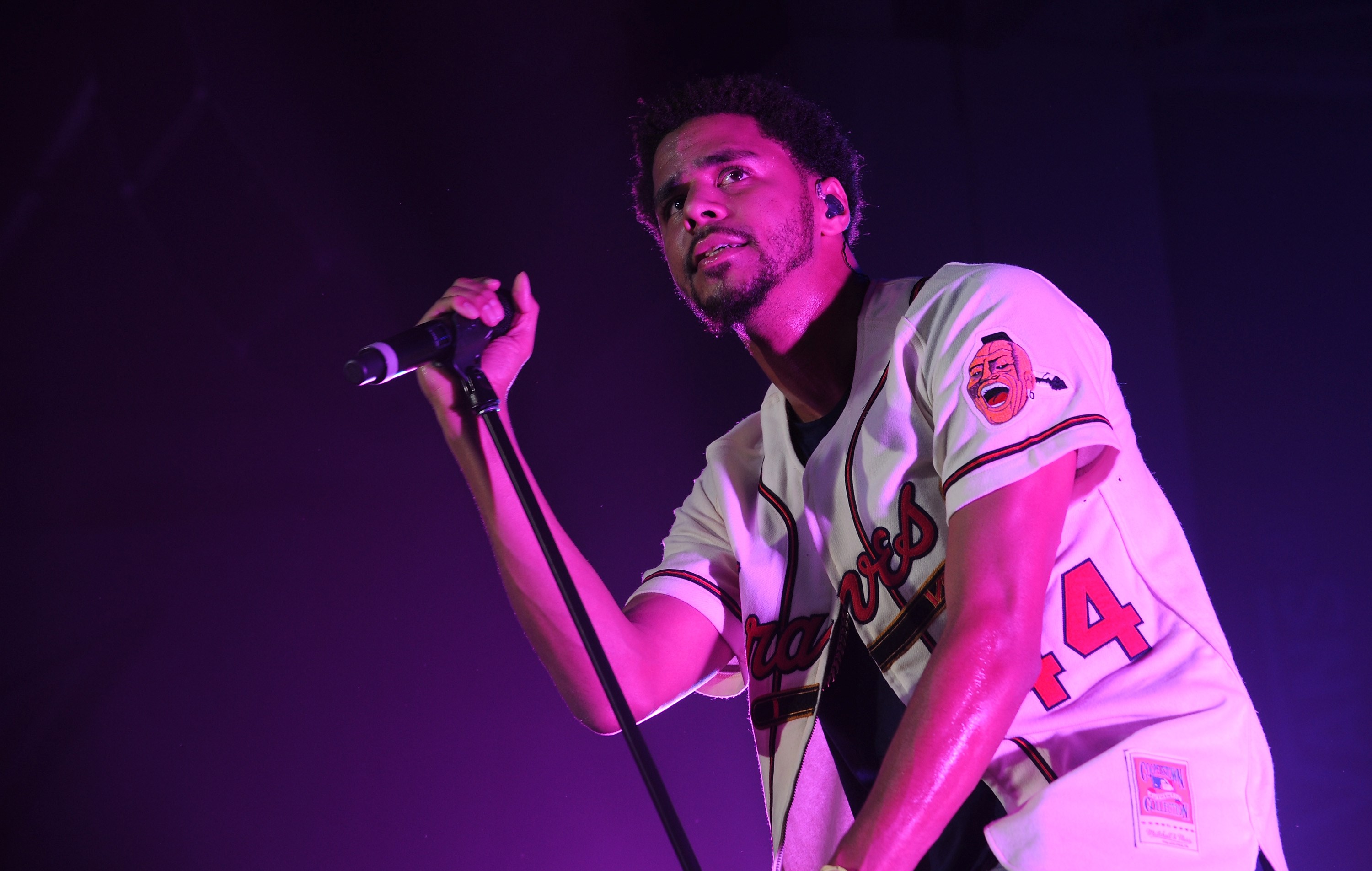 J. Cole performing on stage HD Wallpaper