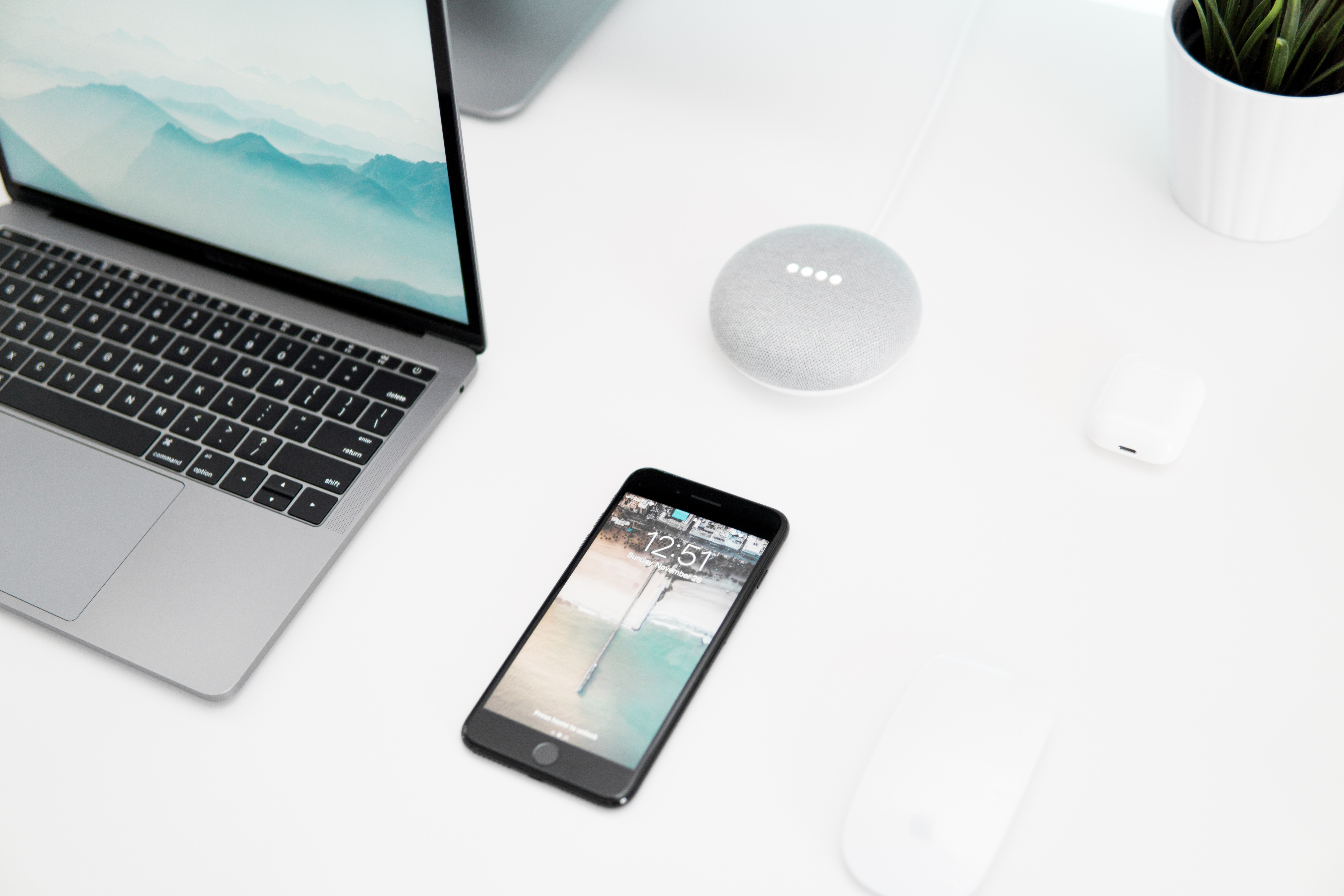 Minimalist Workspace with Laptop, Phone, and Smart Devices HD Wallpaper